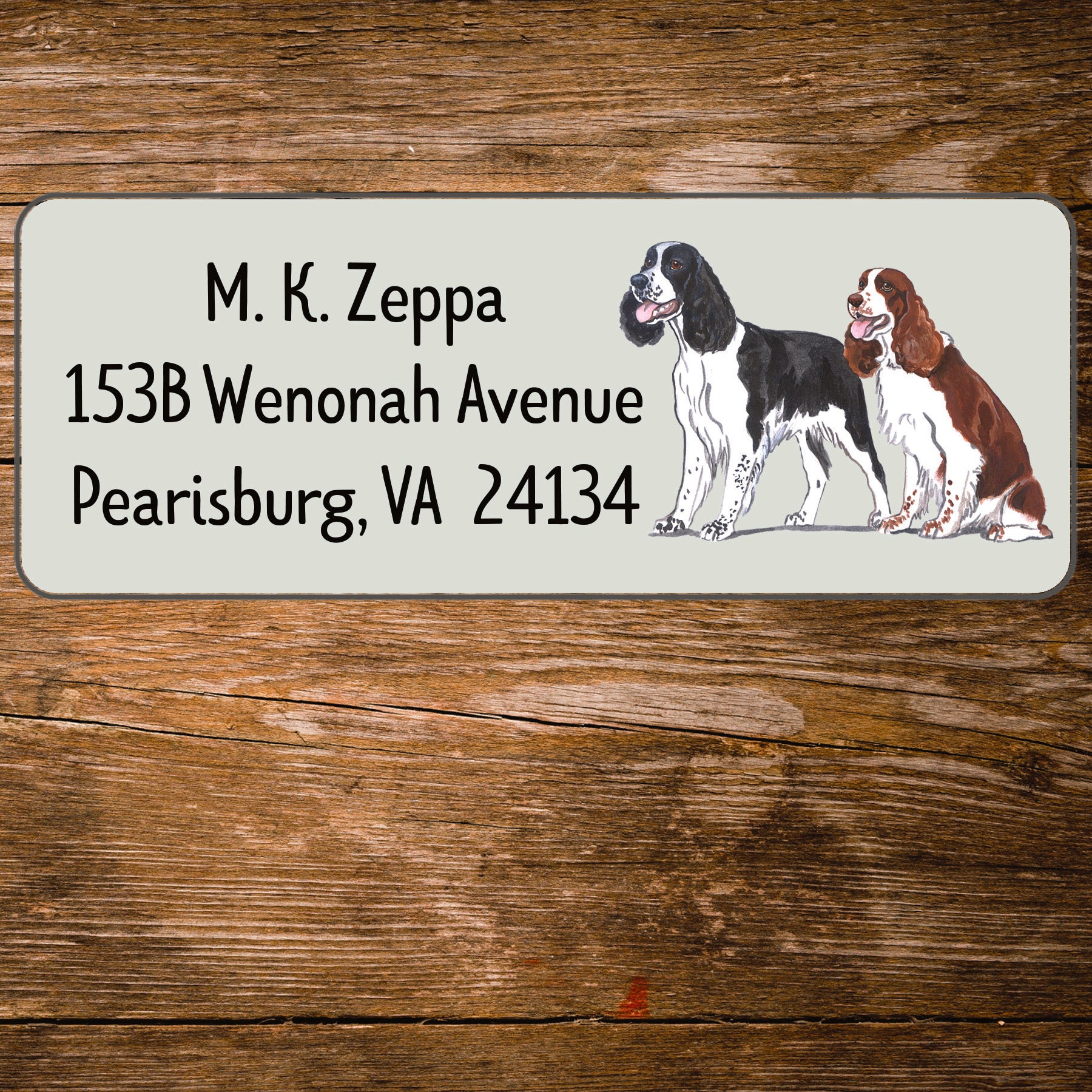 Return address label with a Springer Spaniel illustration.