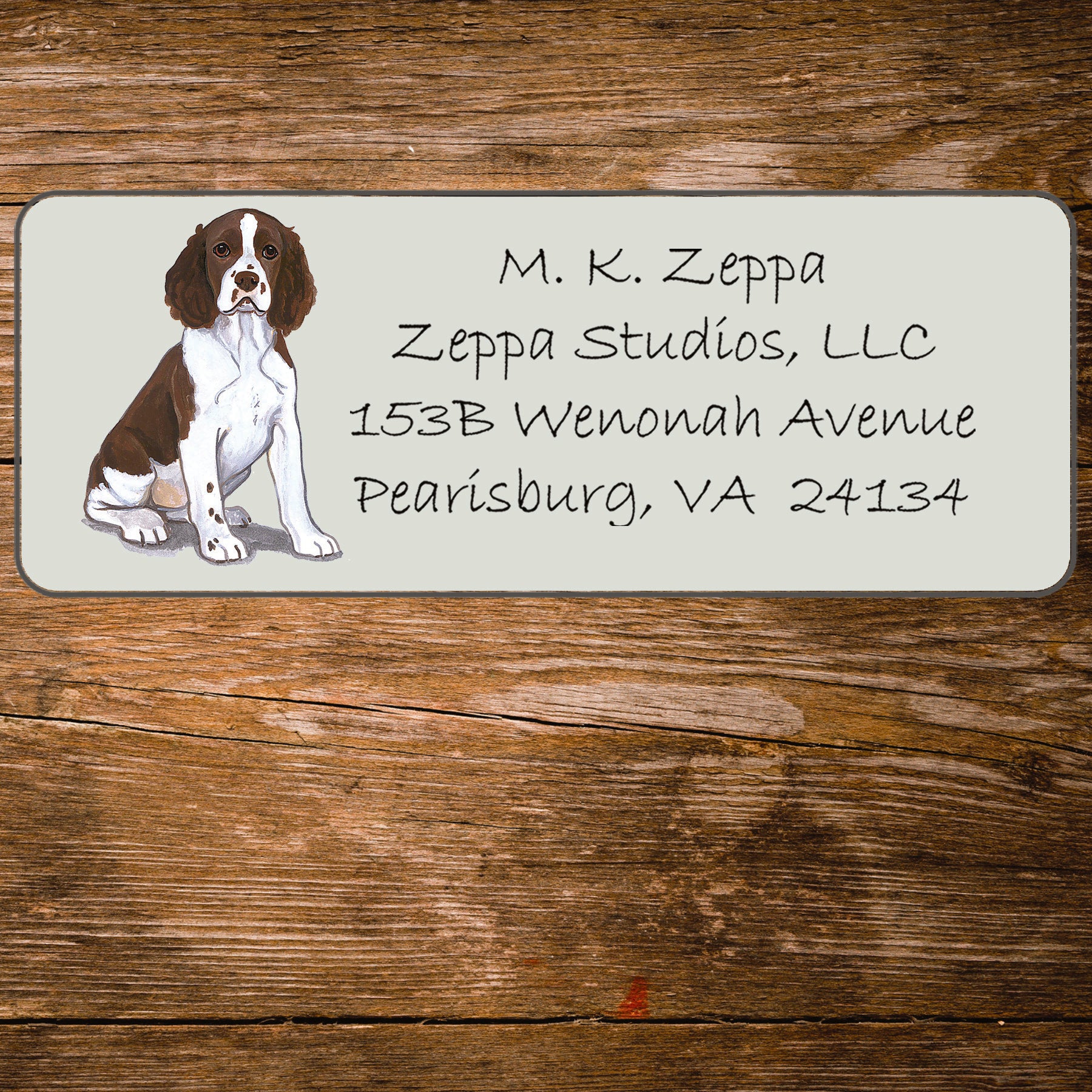 Return address label with a Springer Spaniel illustration.