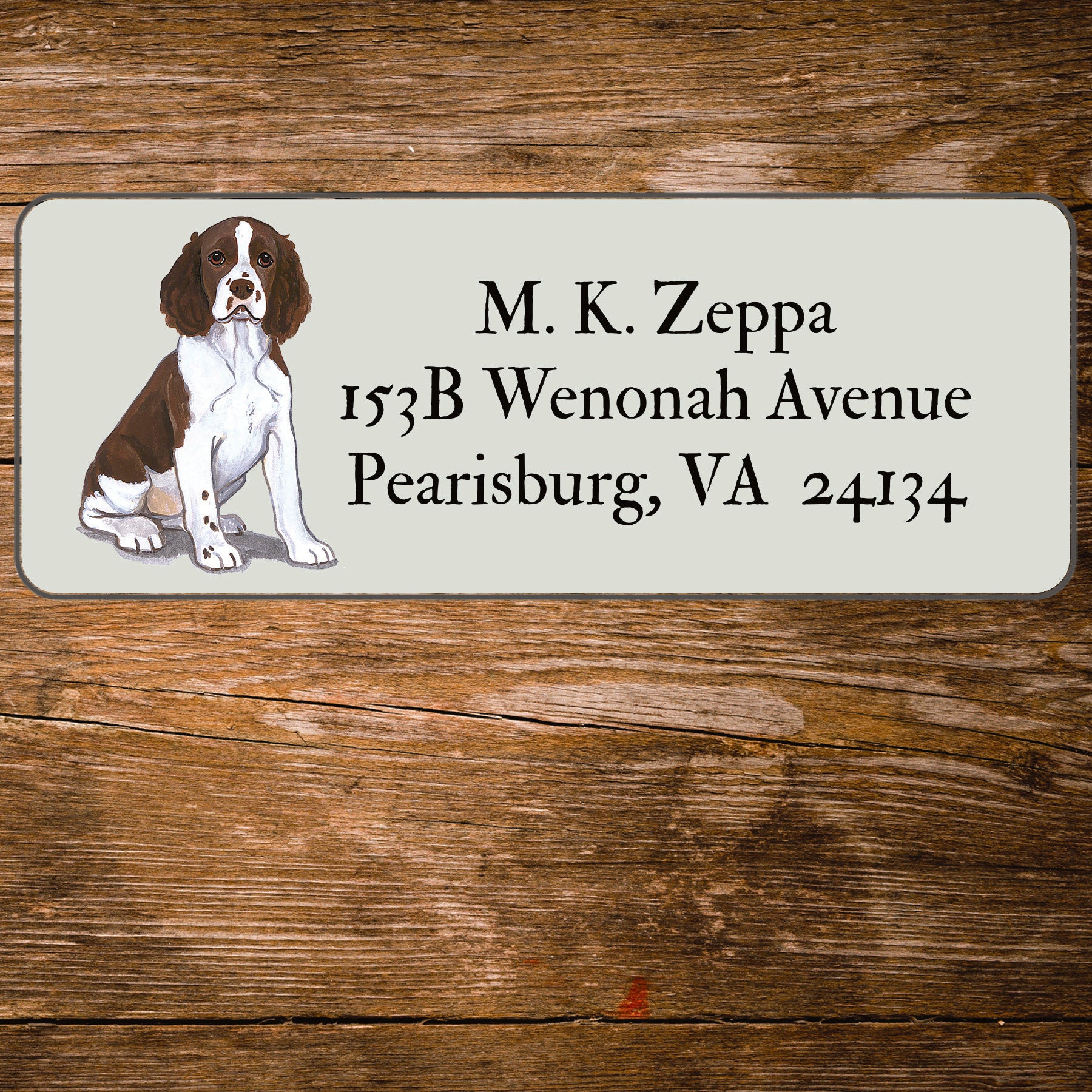 Return address label with a Springer Spaniel illustration.