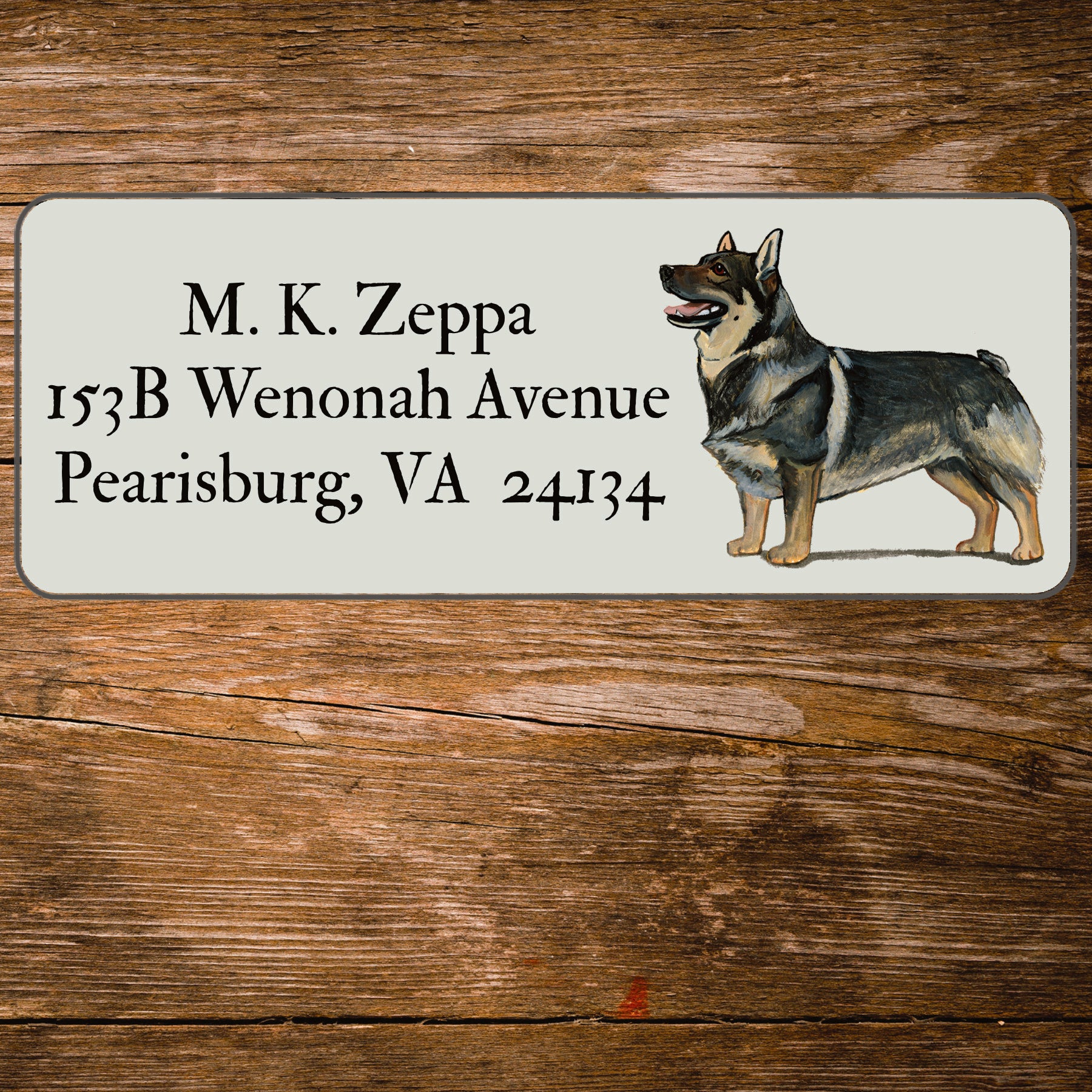 Return address label with a Swedish Valhund illustration.