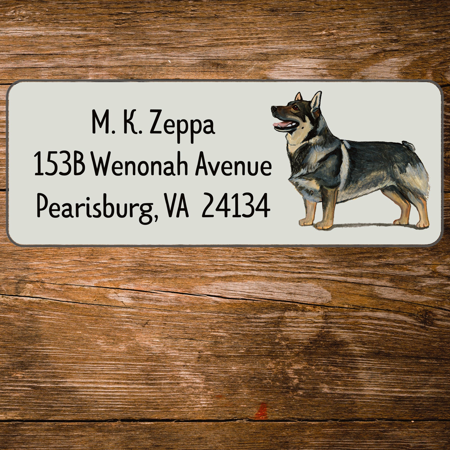Return address label with a Swedish Valhund illustration.