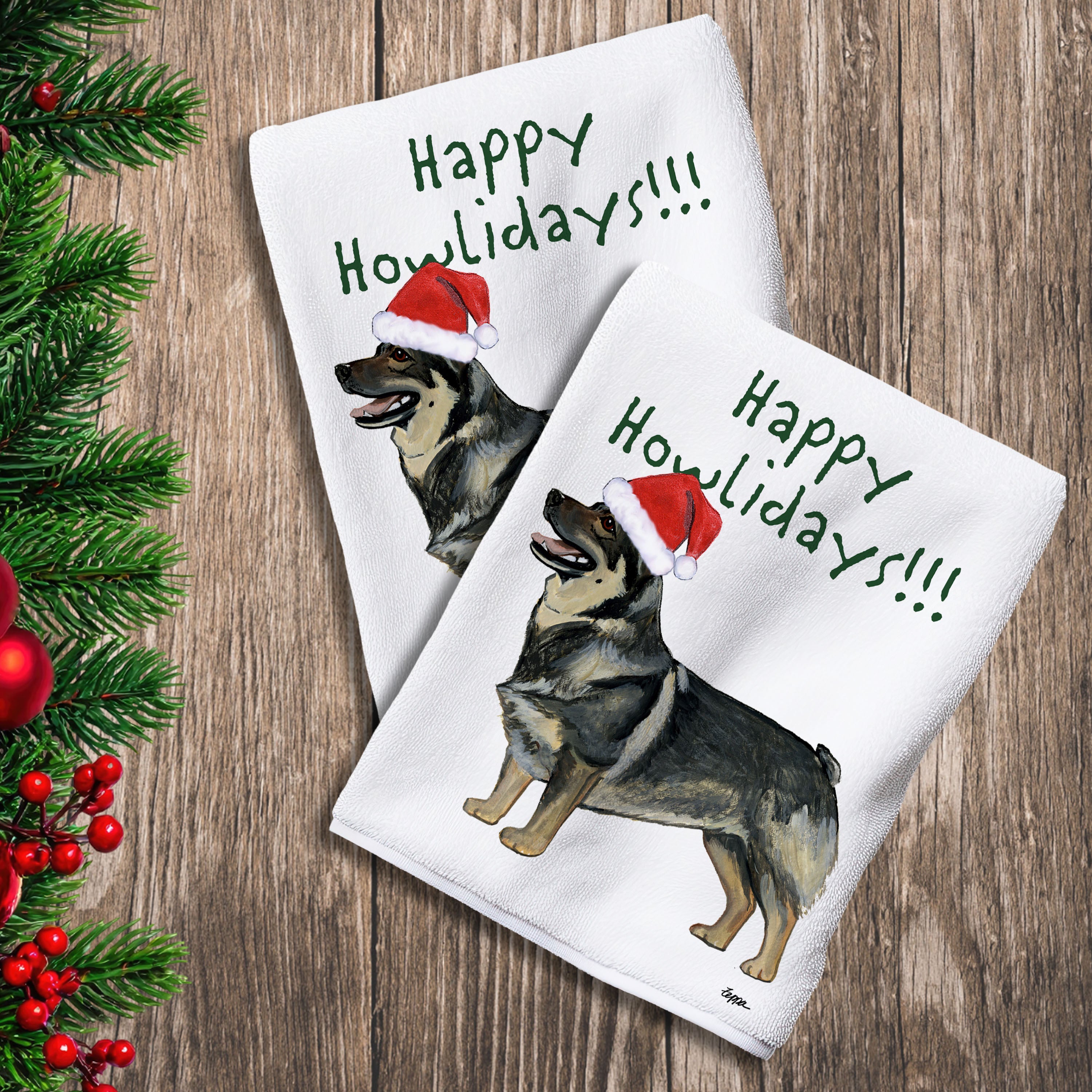 2 Kitchen Towels with a Swedish Vallhund in a Santa Hat and Happy Howlidays text.
