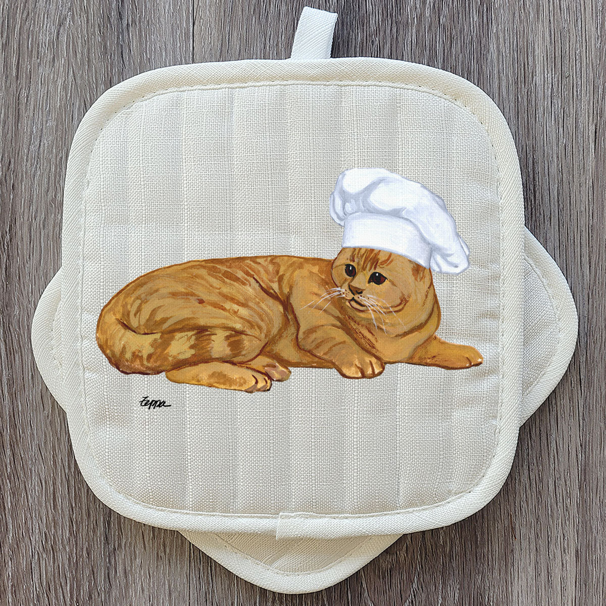 A set of pot holders with a red tabby cat design.