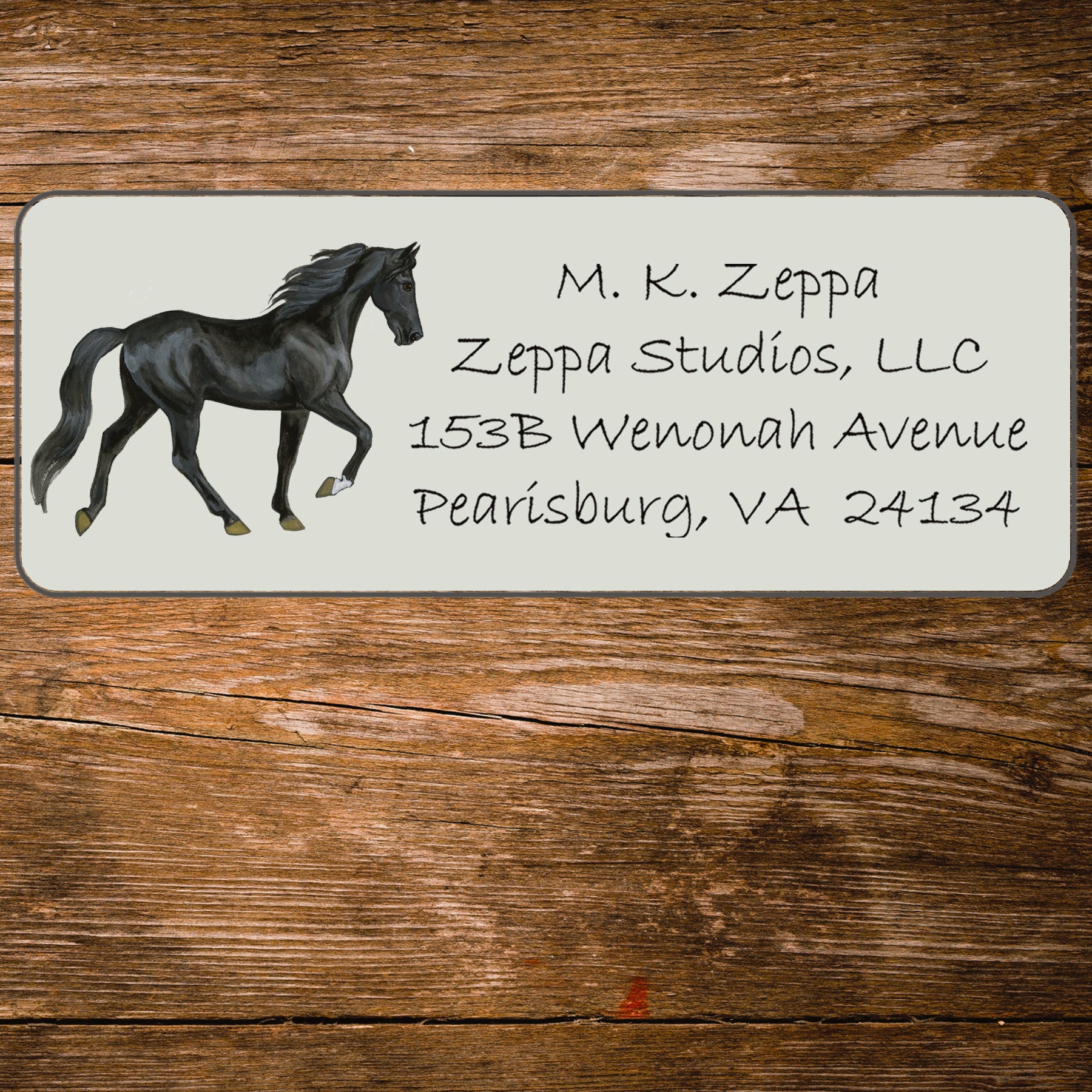 Return address label with an illustration of a Tennessee Walking Horse.
