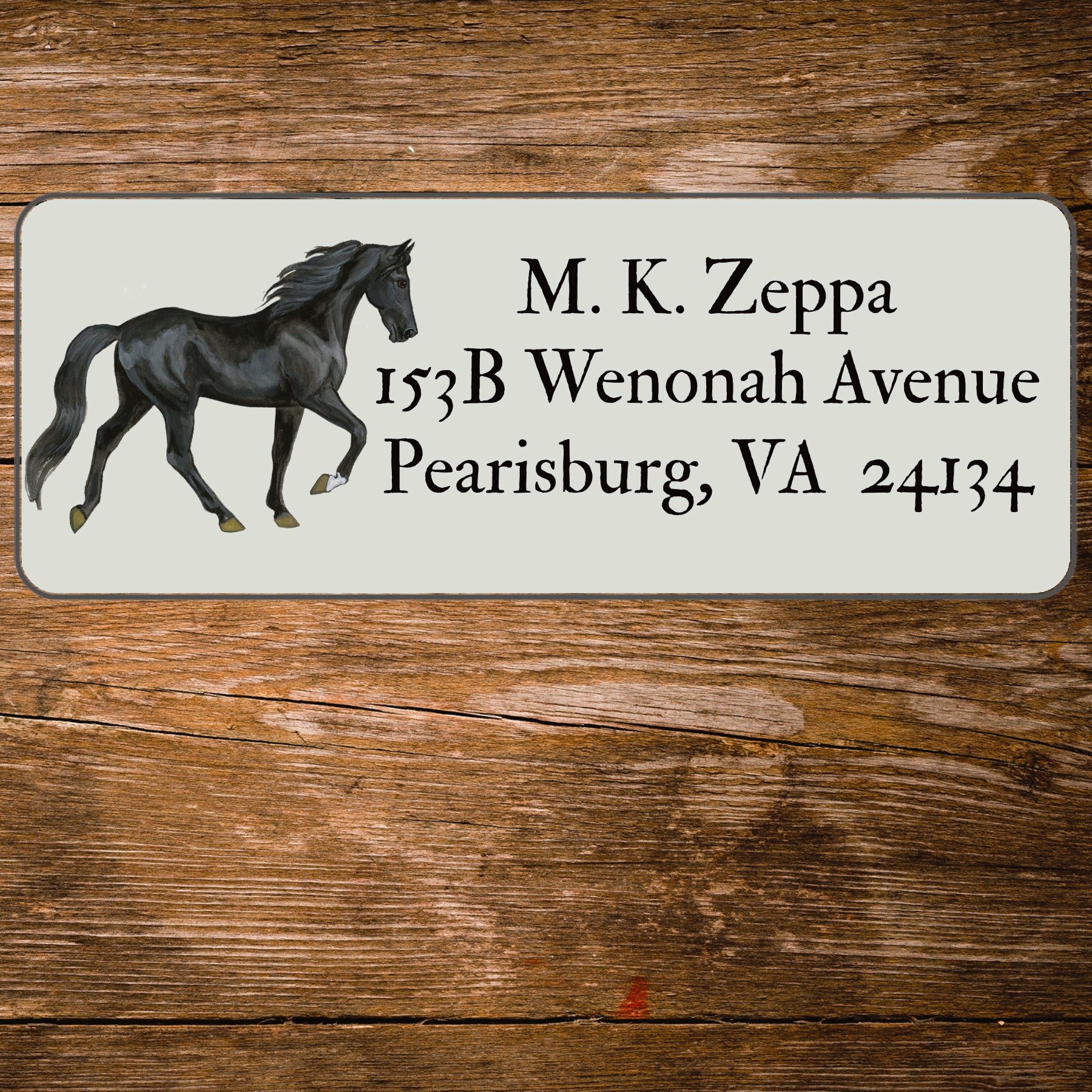 Return address label with an illustration of a Tennessee Walking Horse.