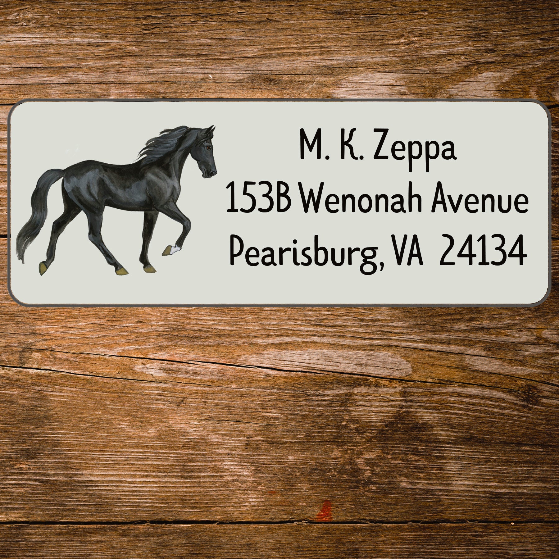 Return address label with an illustration of a Tennessee Walking Horse.