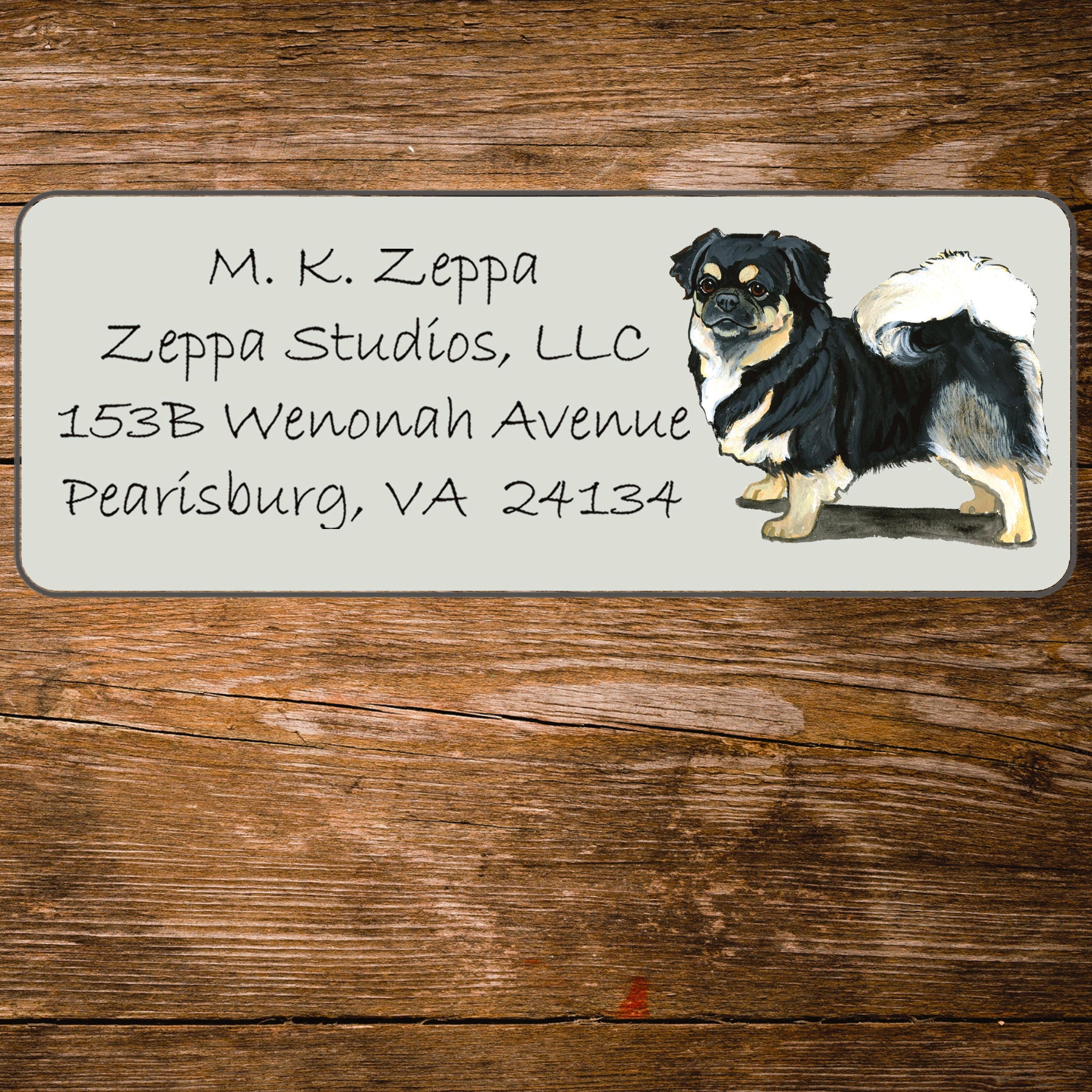 Return address label with a Tibetan Spaniel illustration.