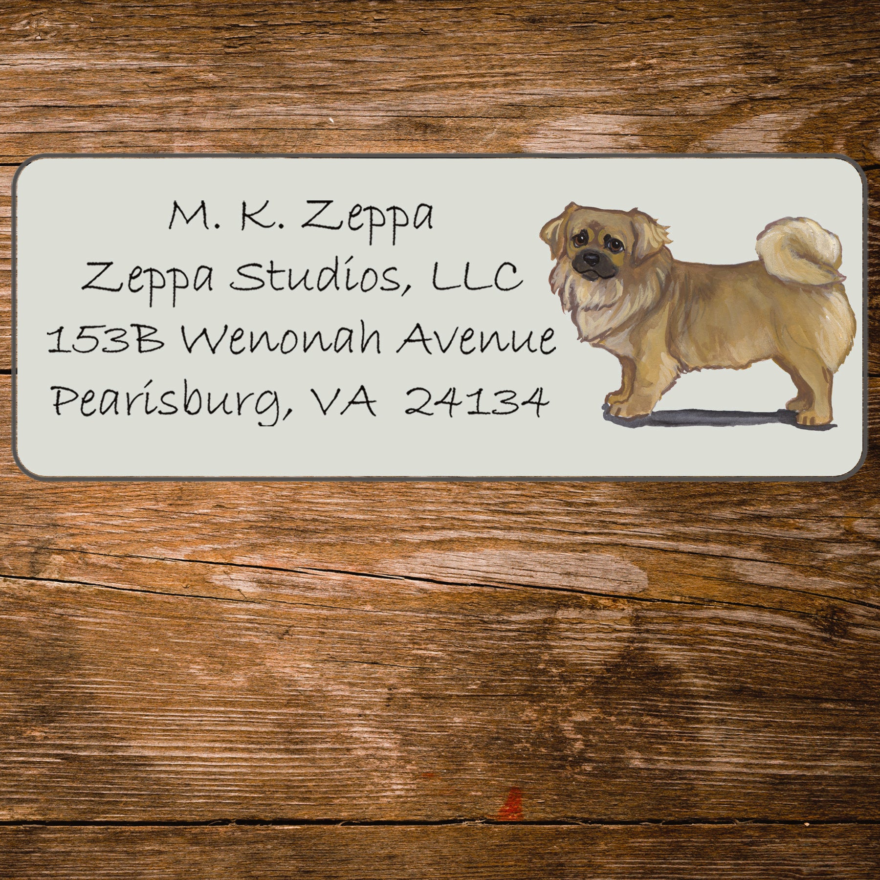 Return address label with a Tibetan Spaniel illustration.