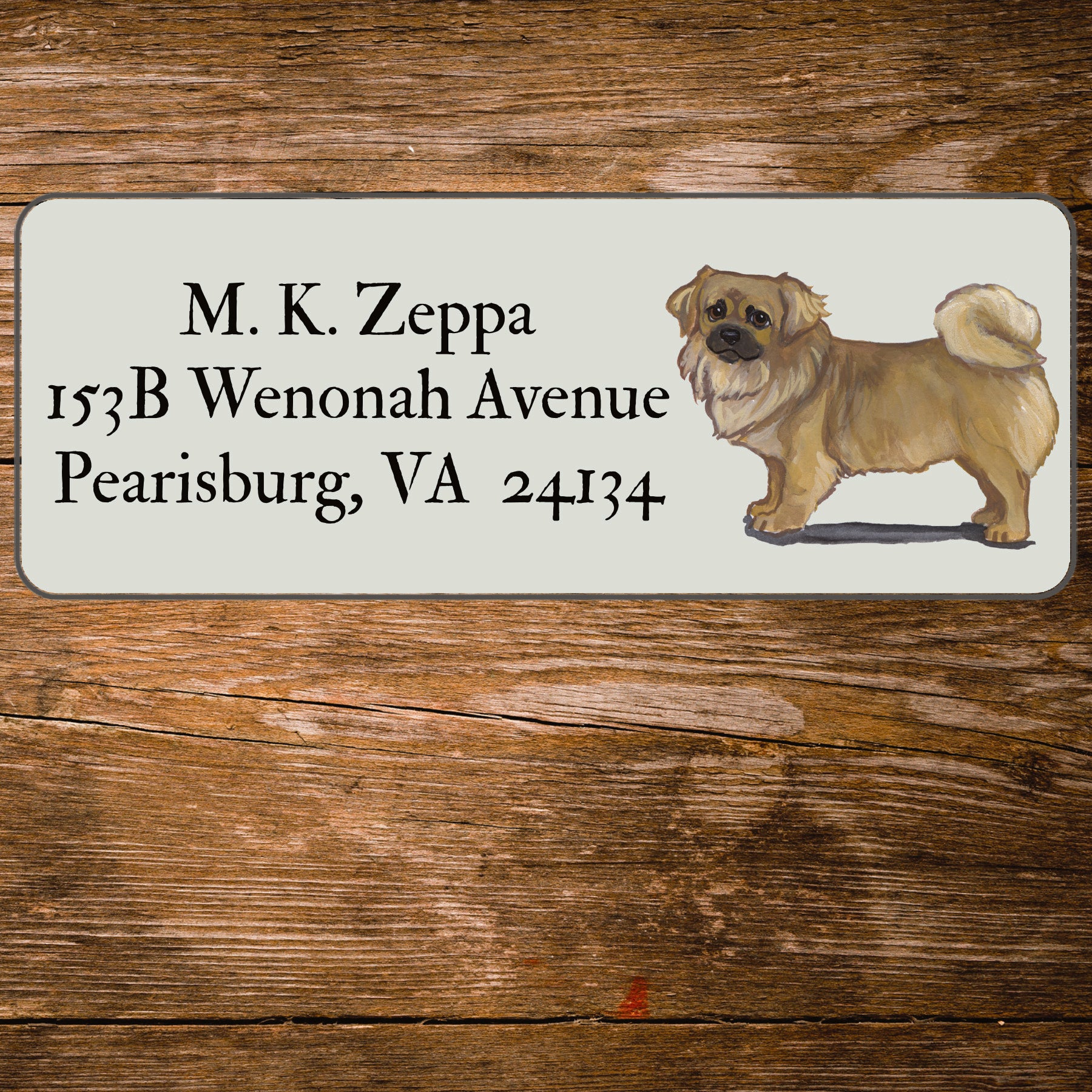 Return address label with a Tibetan Spaniel illustration.