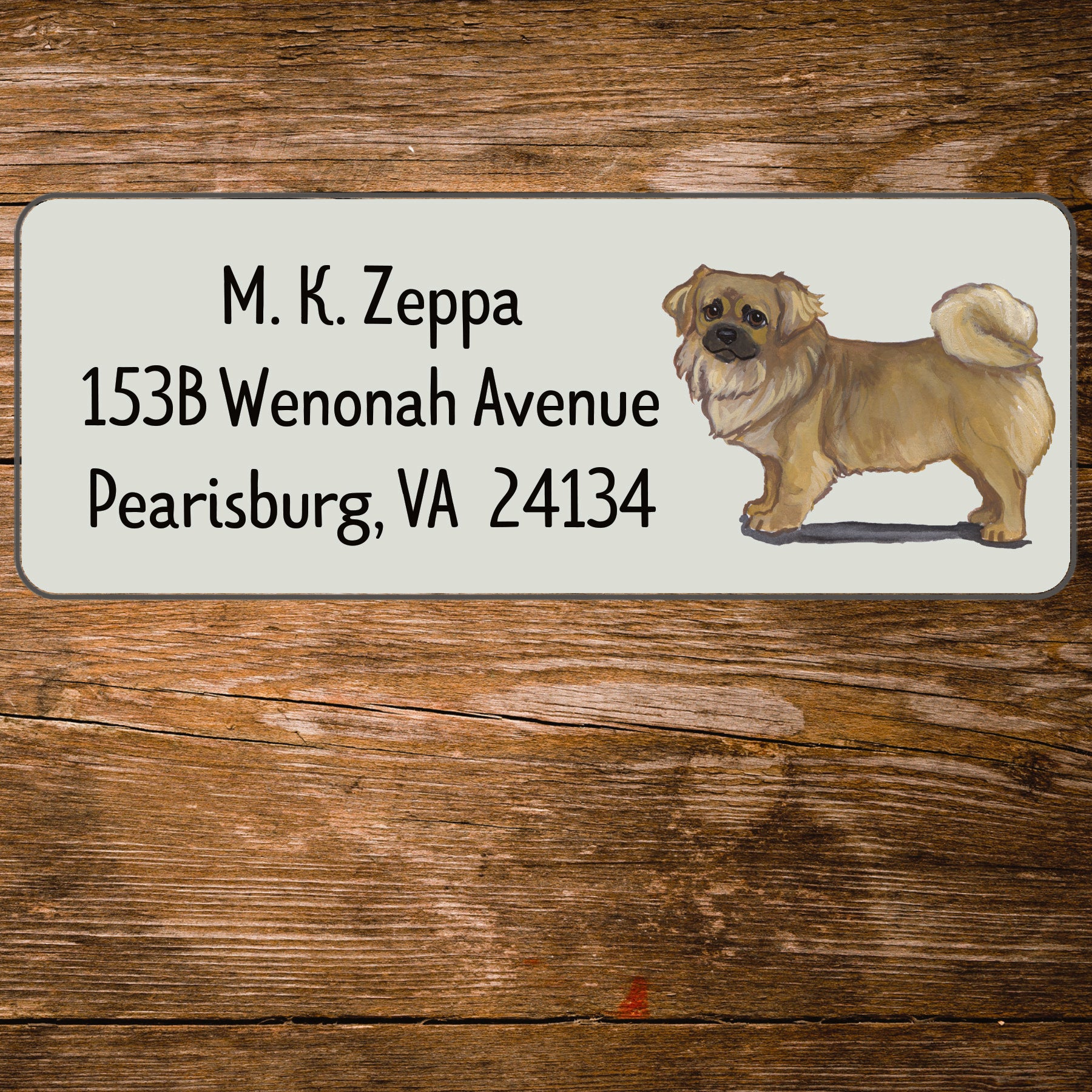 Return address label with a Tibetan Spaniel illustration.