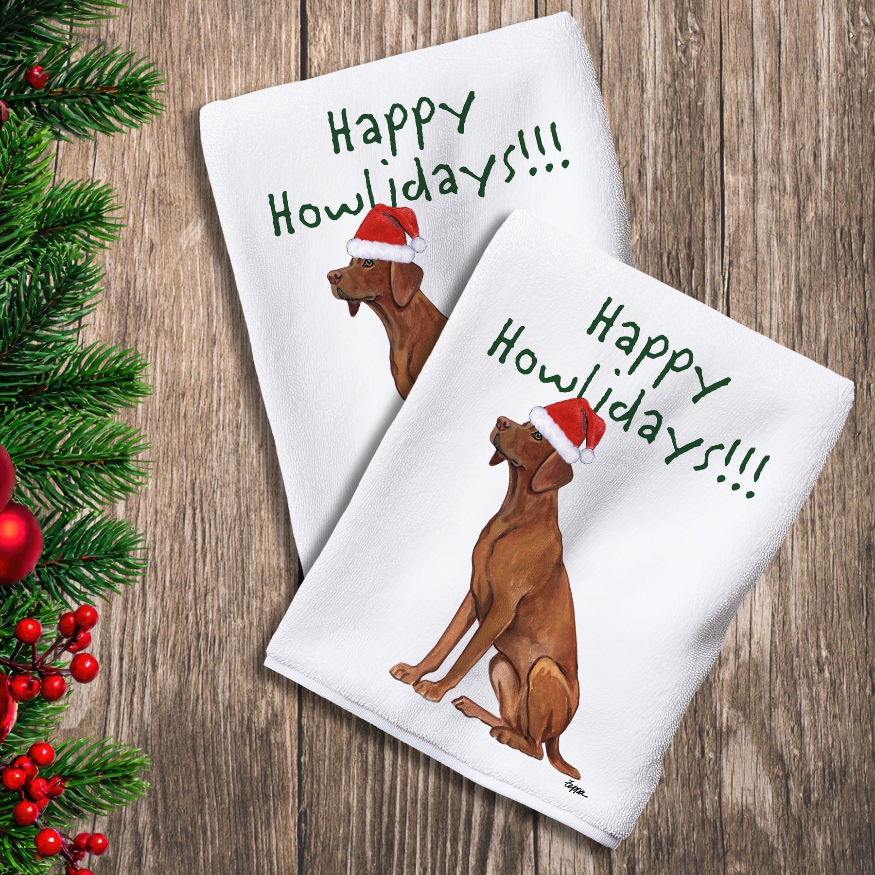 2 Kitchen Towels with a Vizsla in a Santa Hat and Happy Howlidays text.