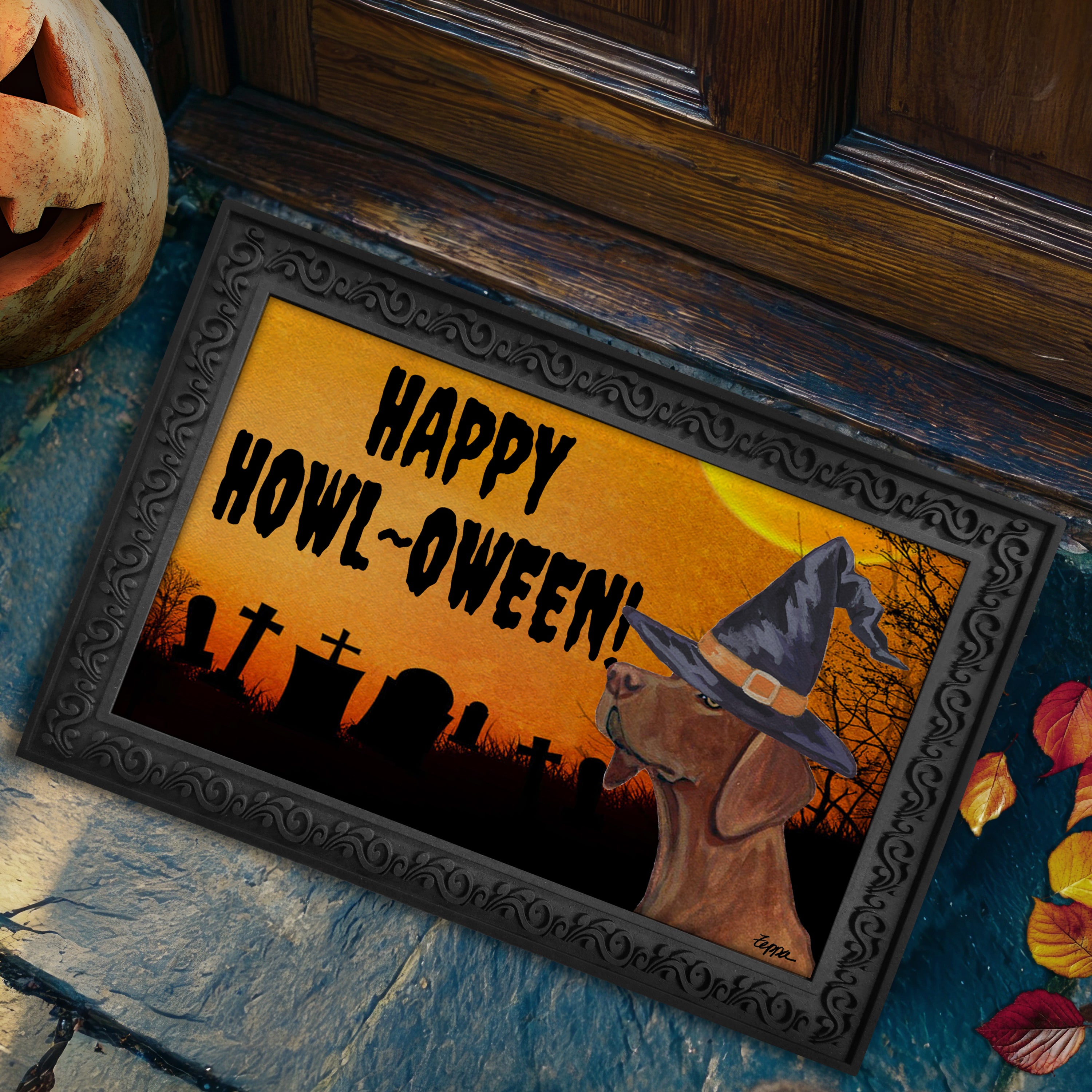 Halloween-themed doormat with a Vizsla wearing a witch hat and 'Happy Howl-Oween!' text.