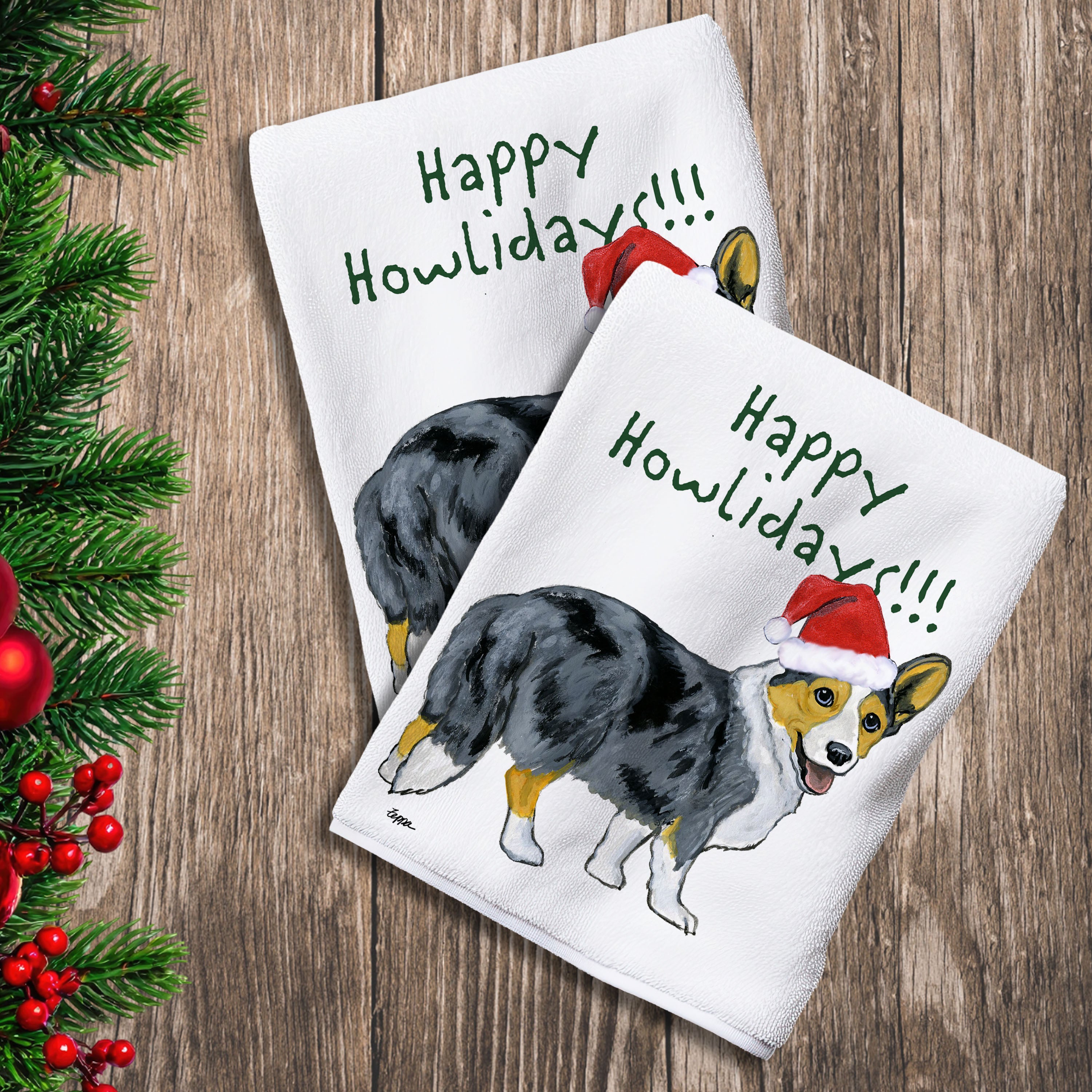2 Kitchen Towels with a blue merle Cardigan Welsh Corgi in a Santa Hat and Happy Howlidays text.