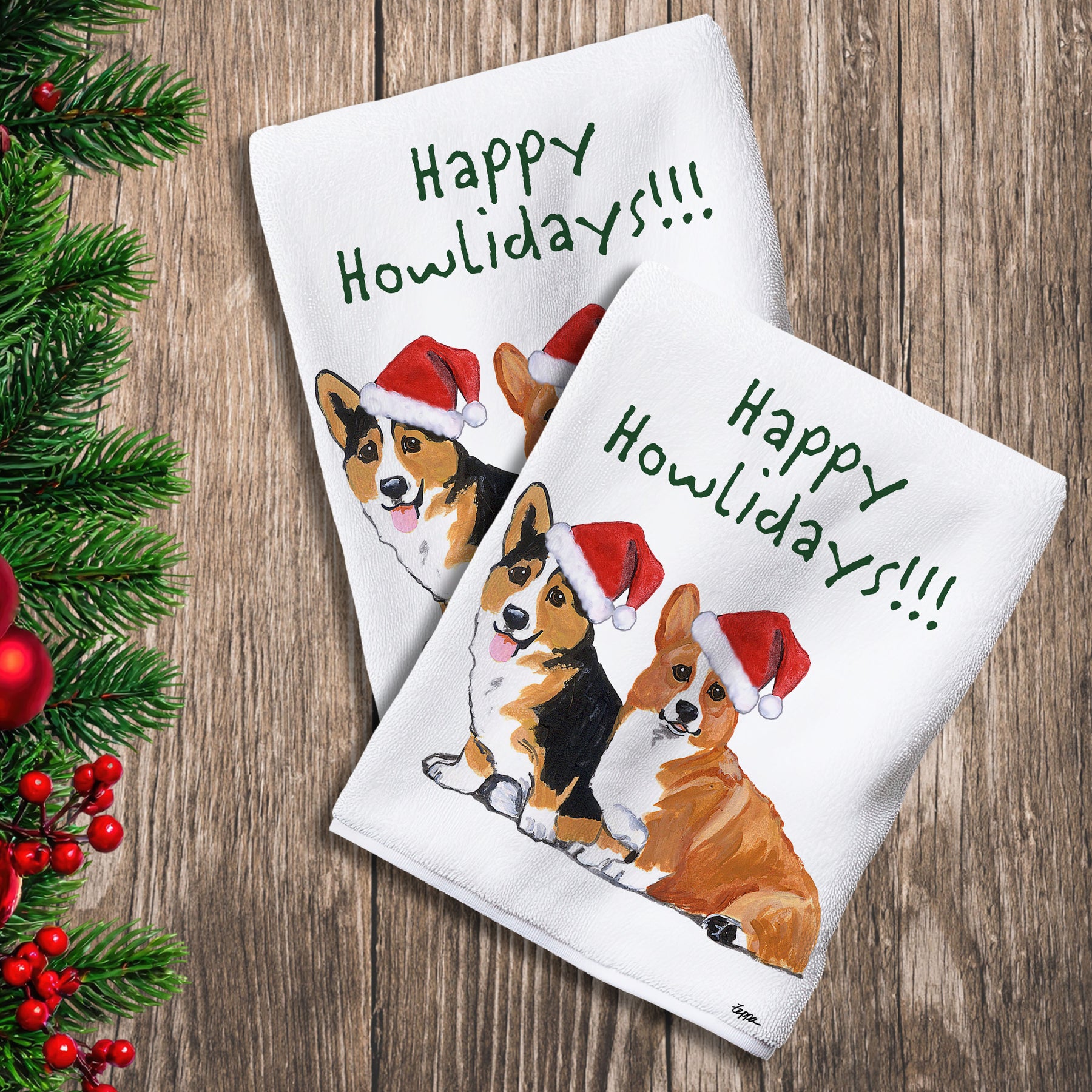 2 Kitchen Towels with a Welsh Corgi pair in a Santa Hat and Happy Howlidays text.