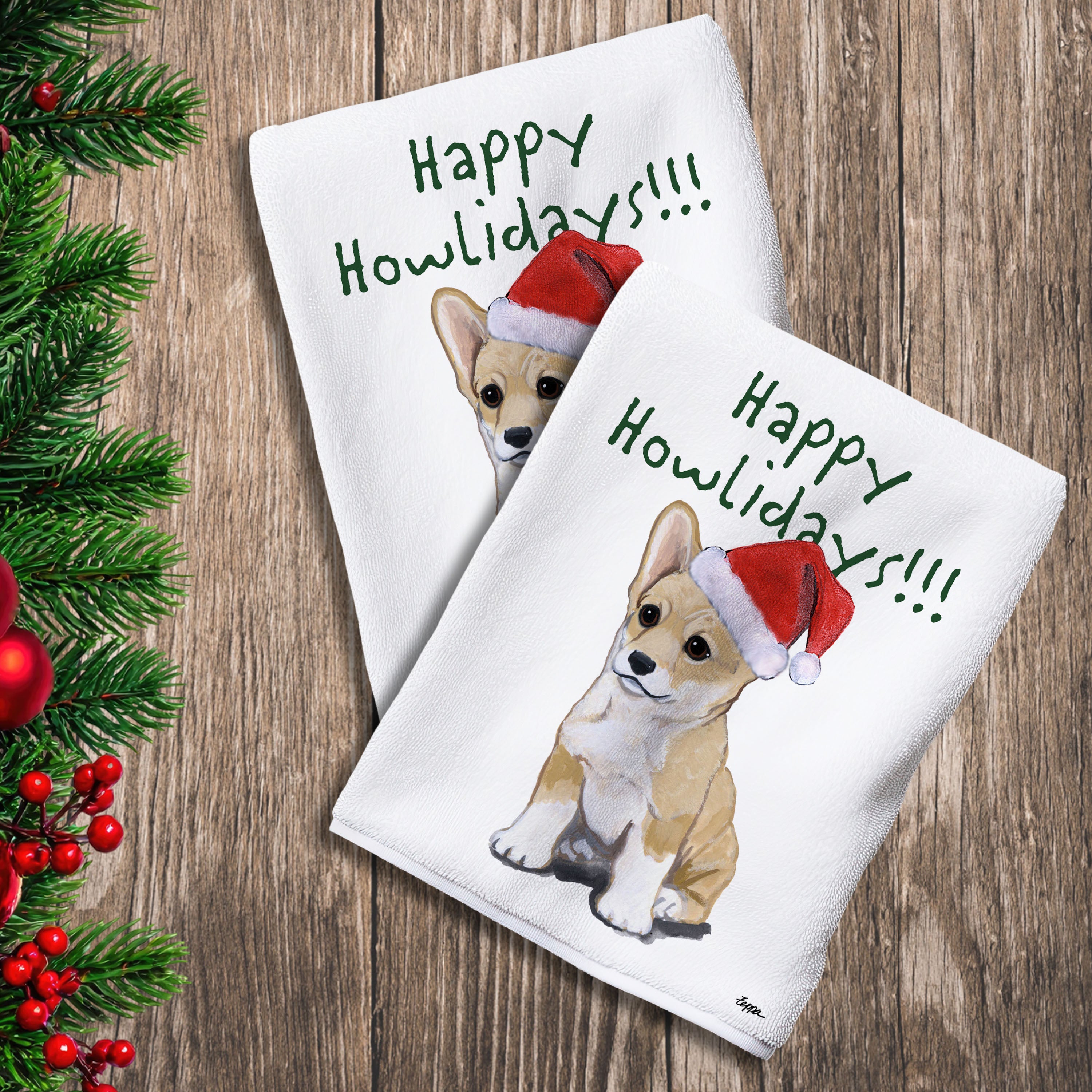 2 Kitchen Towels with a Welsh Corgi puppy in a Santa Hat and Happy Howlidays text.