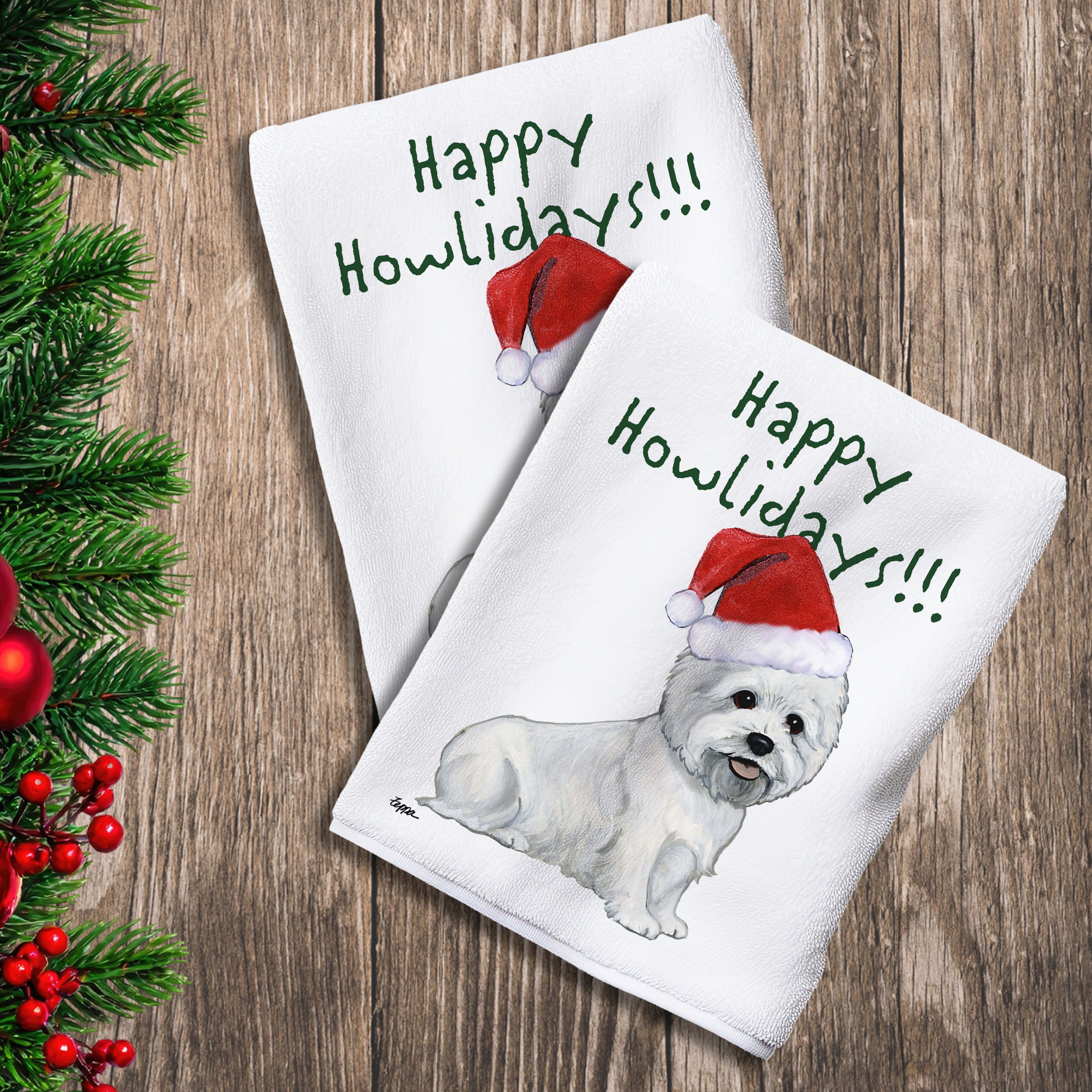 2 Kitchen Towels with a sitting West Highland White Terrier in a Santa Hat and Happy Howlidays text.