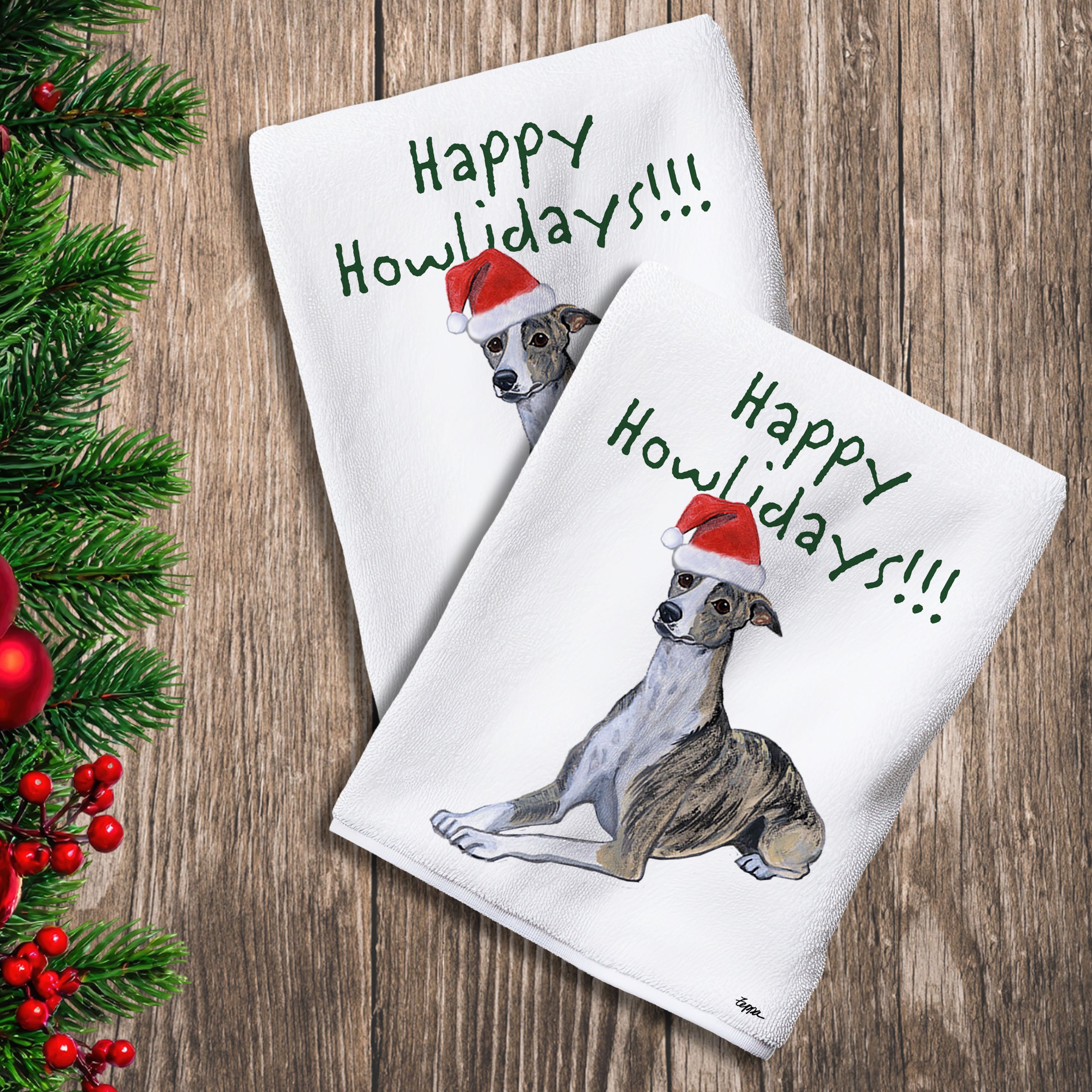2 Kitchen Towels with a Whippet in a Santa Hat and Happy Howlidays text.
