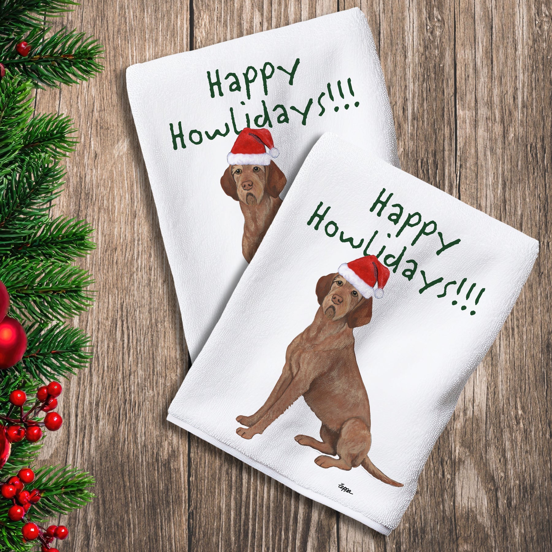 2 Kitchen Towels with a Wirehaired Vizsla in a Santa Hat and Happy Howlidays text.
