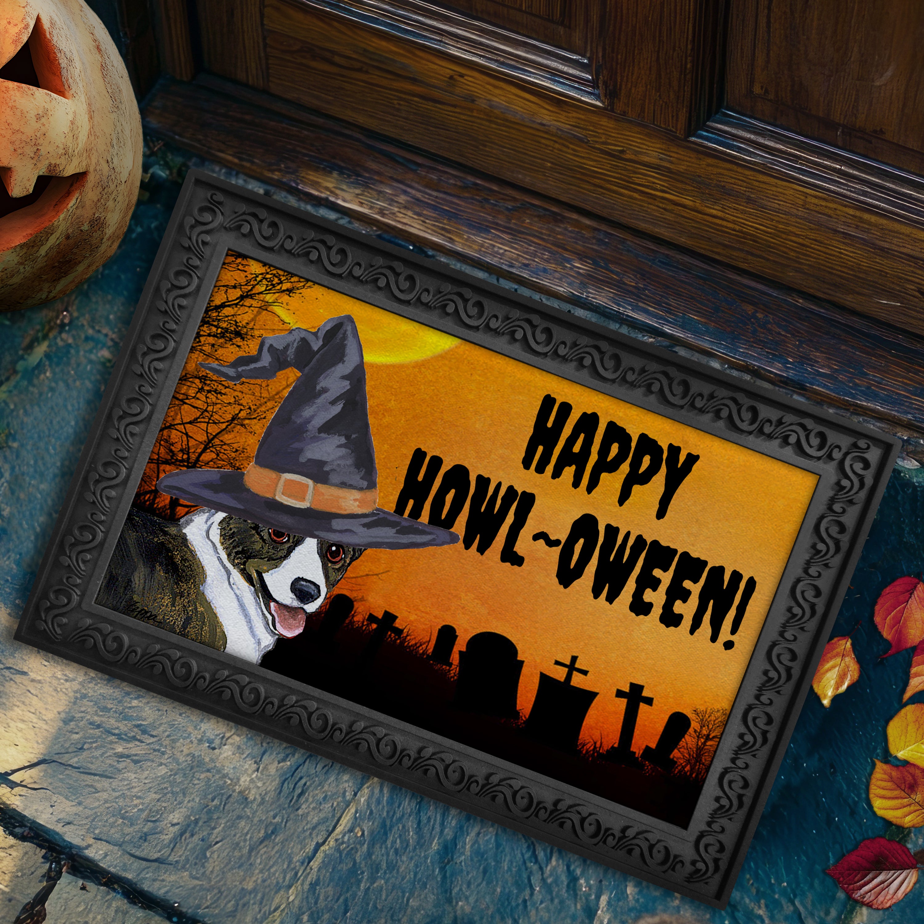 Halloween-themed doormat with a Cardigna Welsh Corgi wearing a witch hat and 'Happy Howl-O-Ween!' text, placed on a stone step.