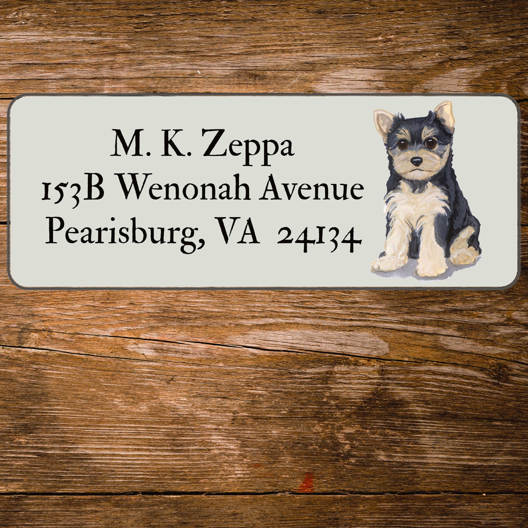 Return address label with a Yorkshire Terrier illustration.