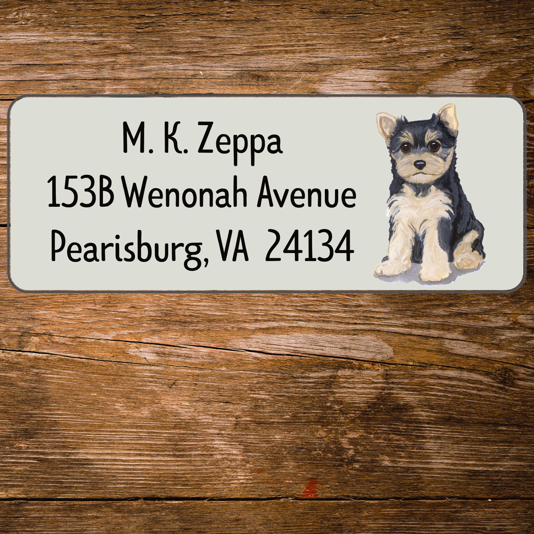 Return address label with a Yorkshire Terrier illustration.