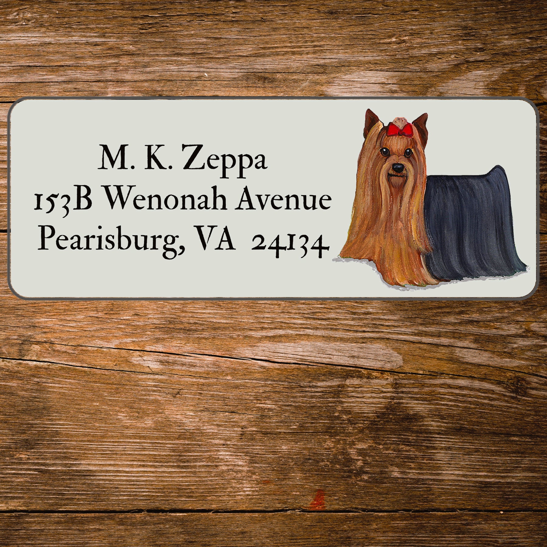 Return address label with a Yorkshire Terrier illustration.