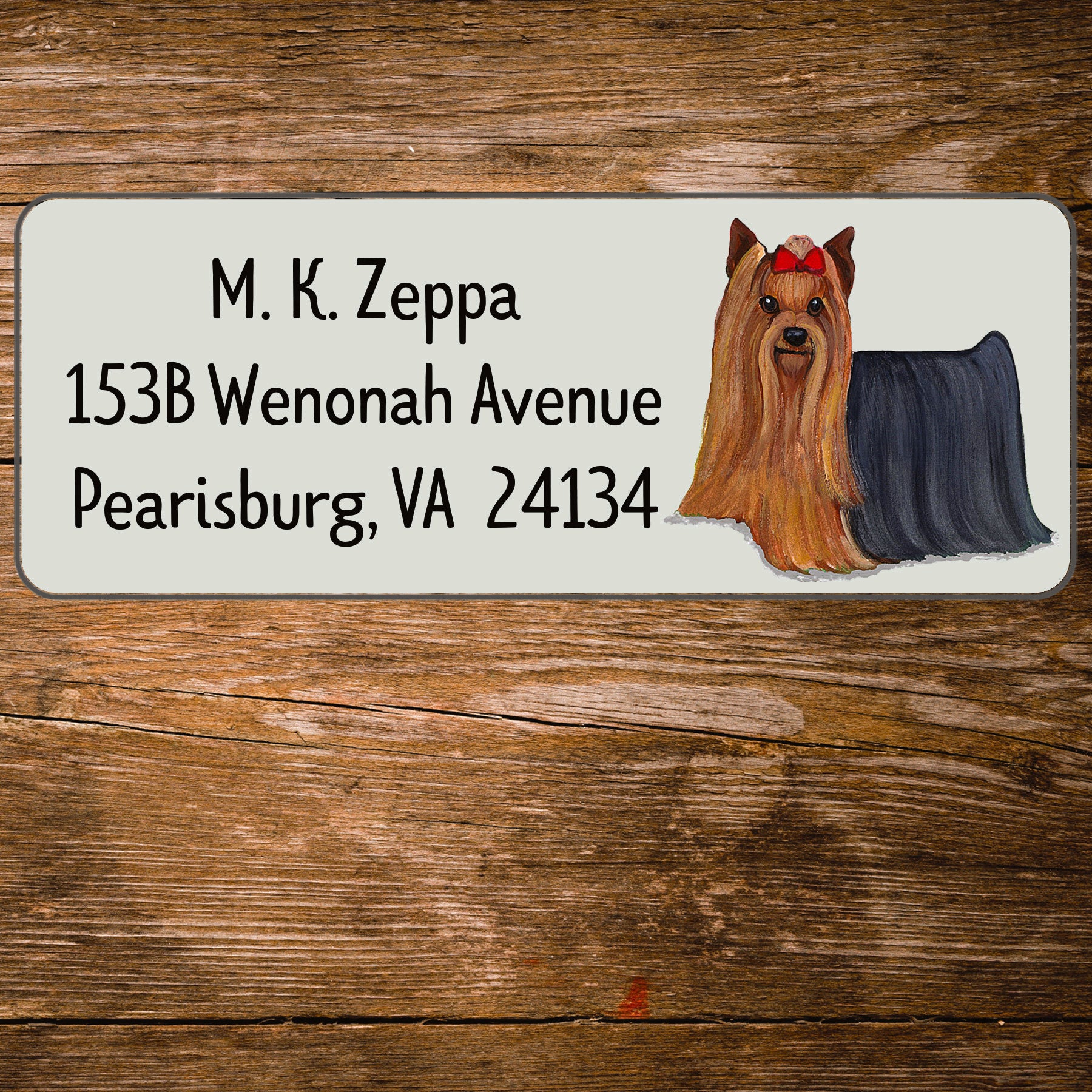 Return address label with a Yorkshire Terrier illustration.