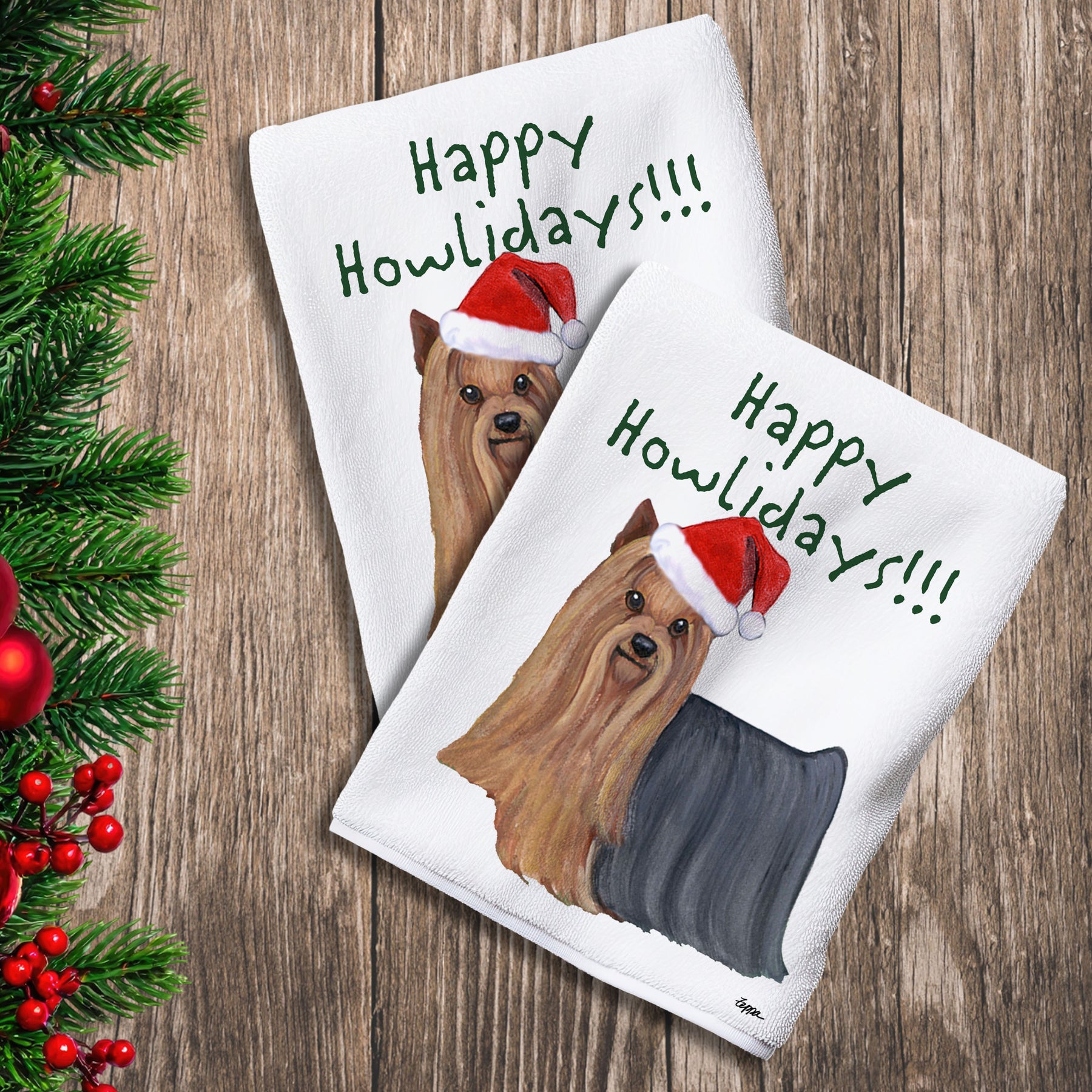 2 Kitchen Towels with a Yorkshire Terrier in a Santa Hat and Happy Howlidays text.