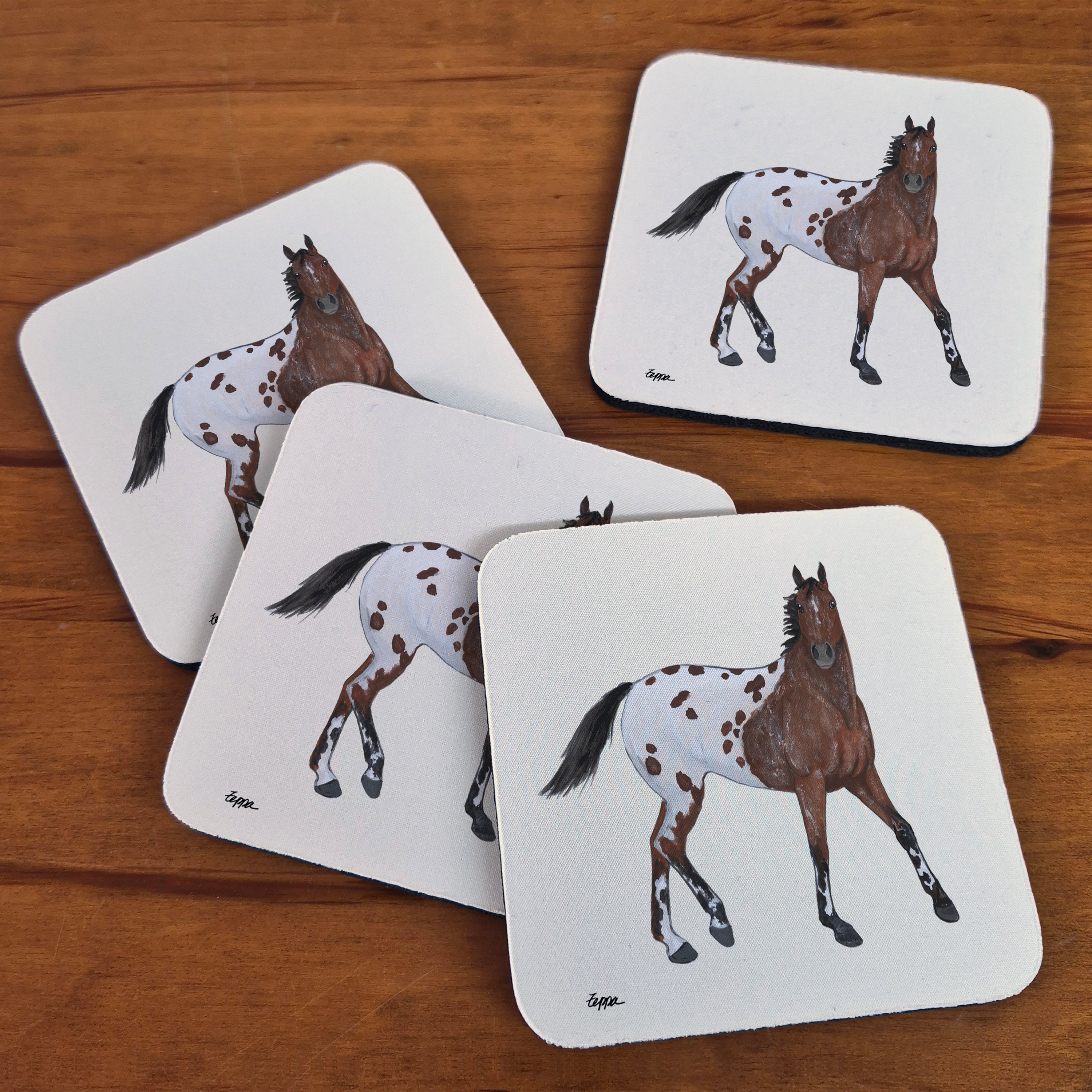 Appaloosa design on beige poly-rubber beverage coasters.
