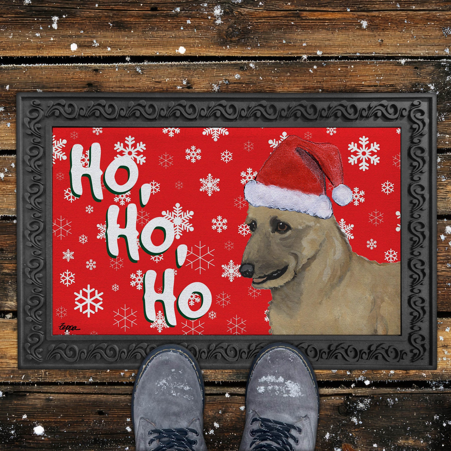 Holiday doormat with a Belgian Laekenois in a Santa hat on a red snowflake background
