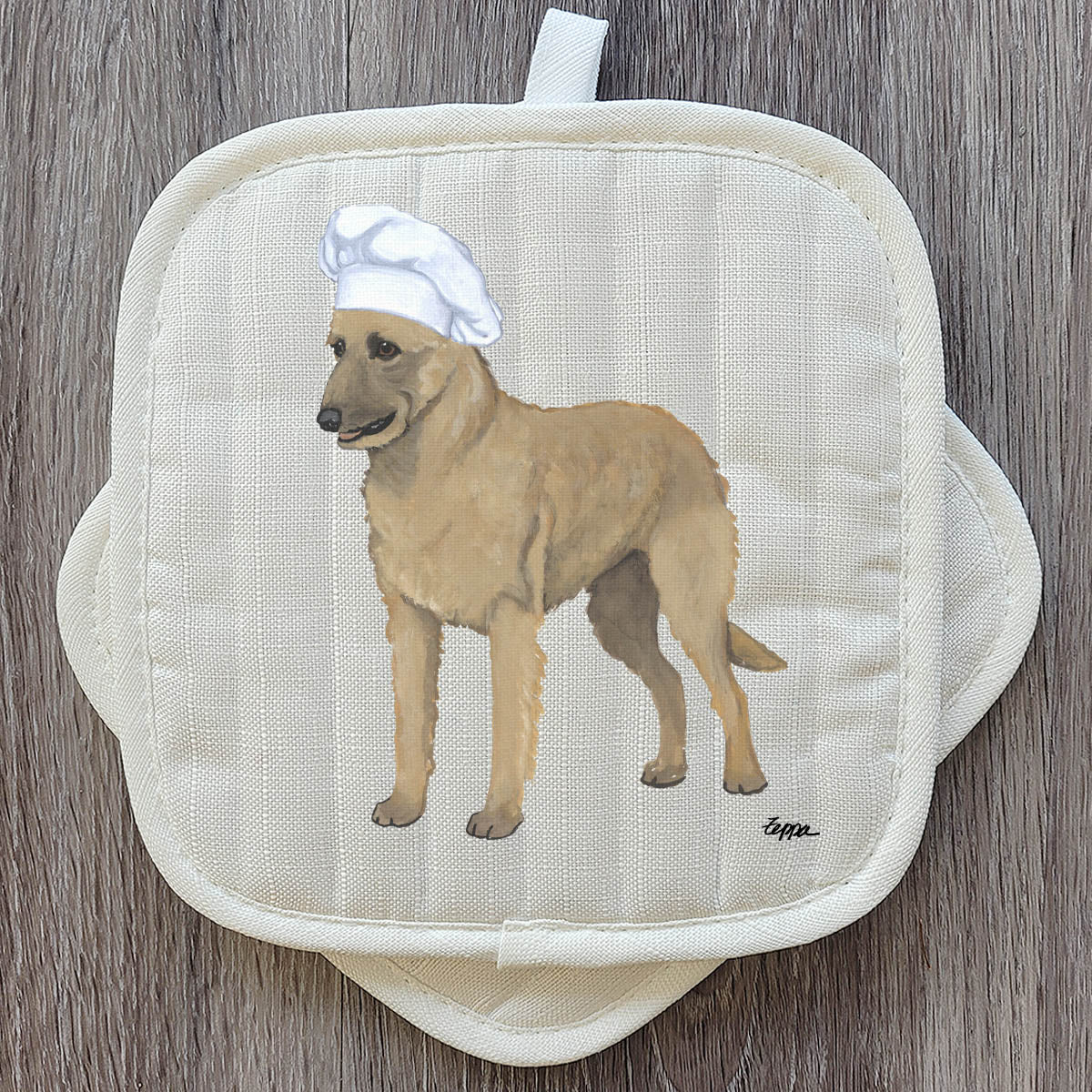 Set of beige pot holders with a Belgian Laekenois in a Chef's hat
