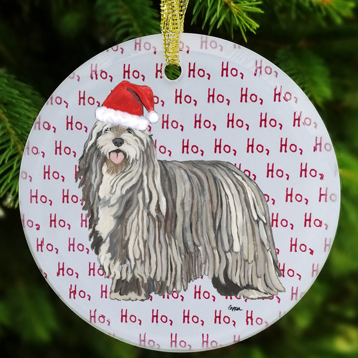 Glass Christmas ornament with a Bergamasco wearing a Santa hat on a background of 'Ho Ho Ho' text