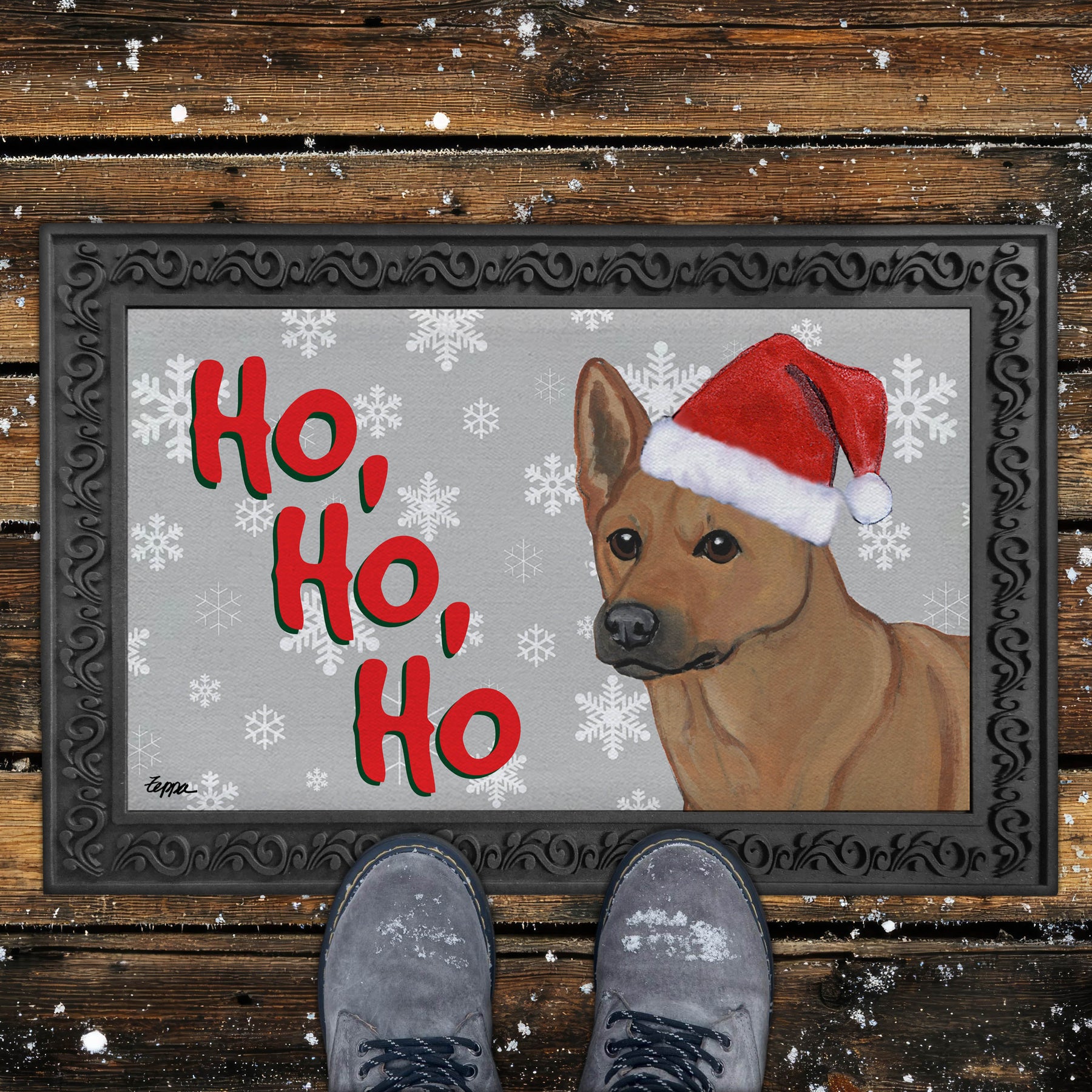 Door Mat with a Carolina dog wearing a Santa hat and 'Ho, Ho, Ho' text on a grey background with snowflakes.
