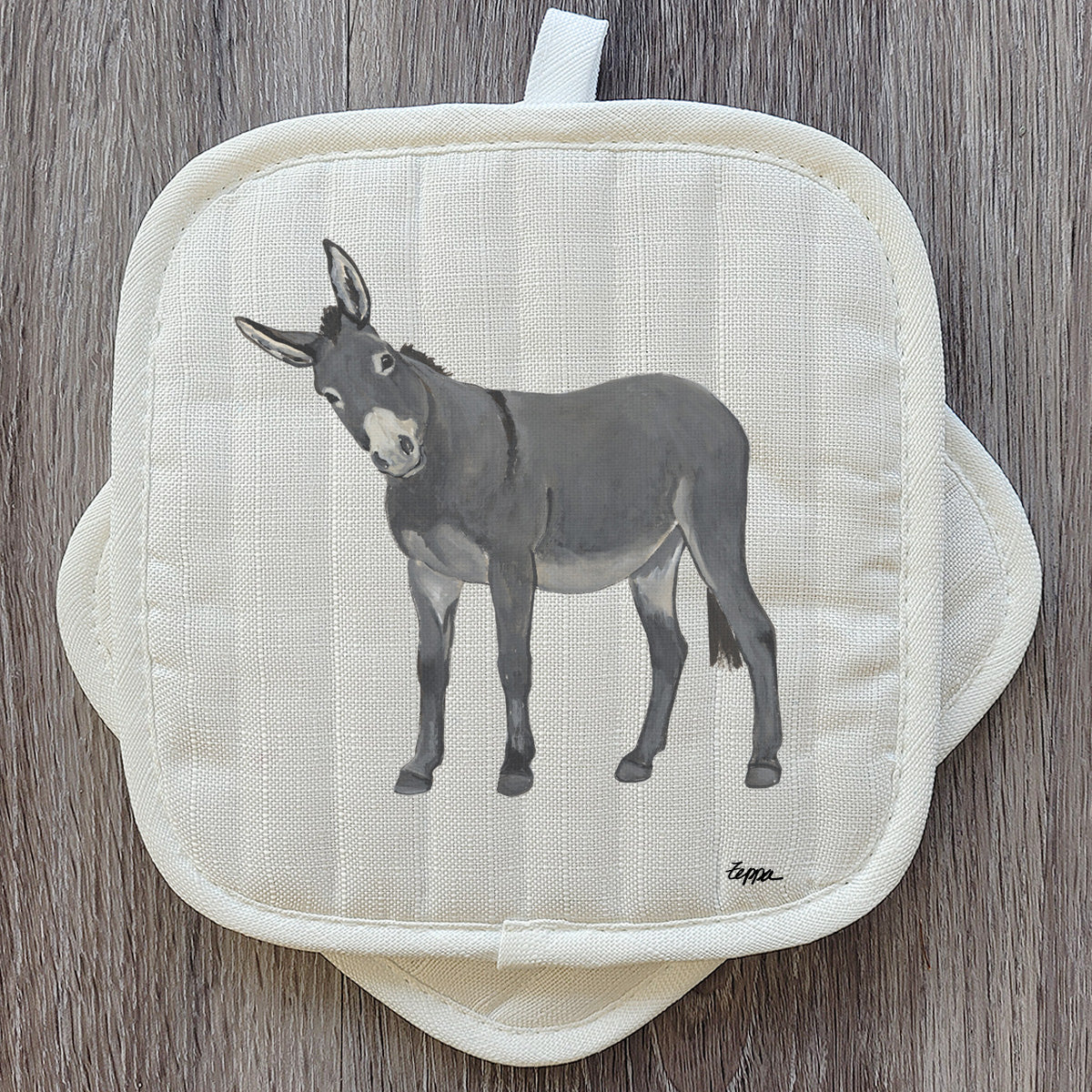 Donkey design beige pot holder set.