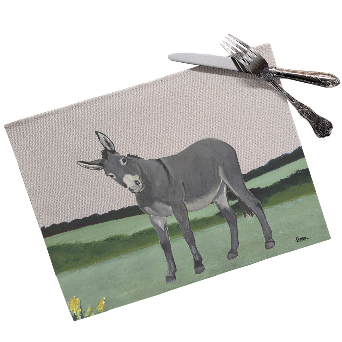 Donkey in a field on a linen placemat.