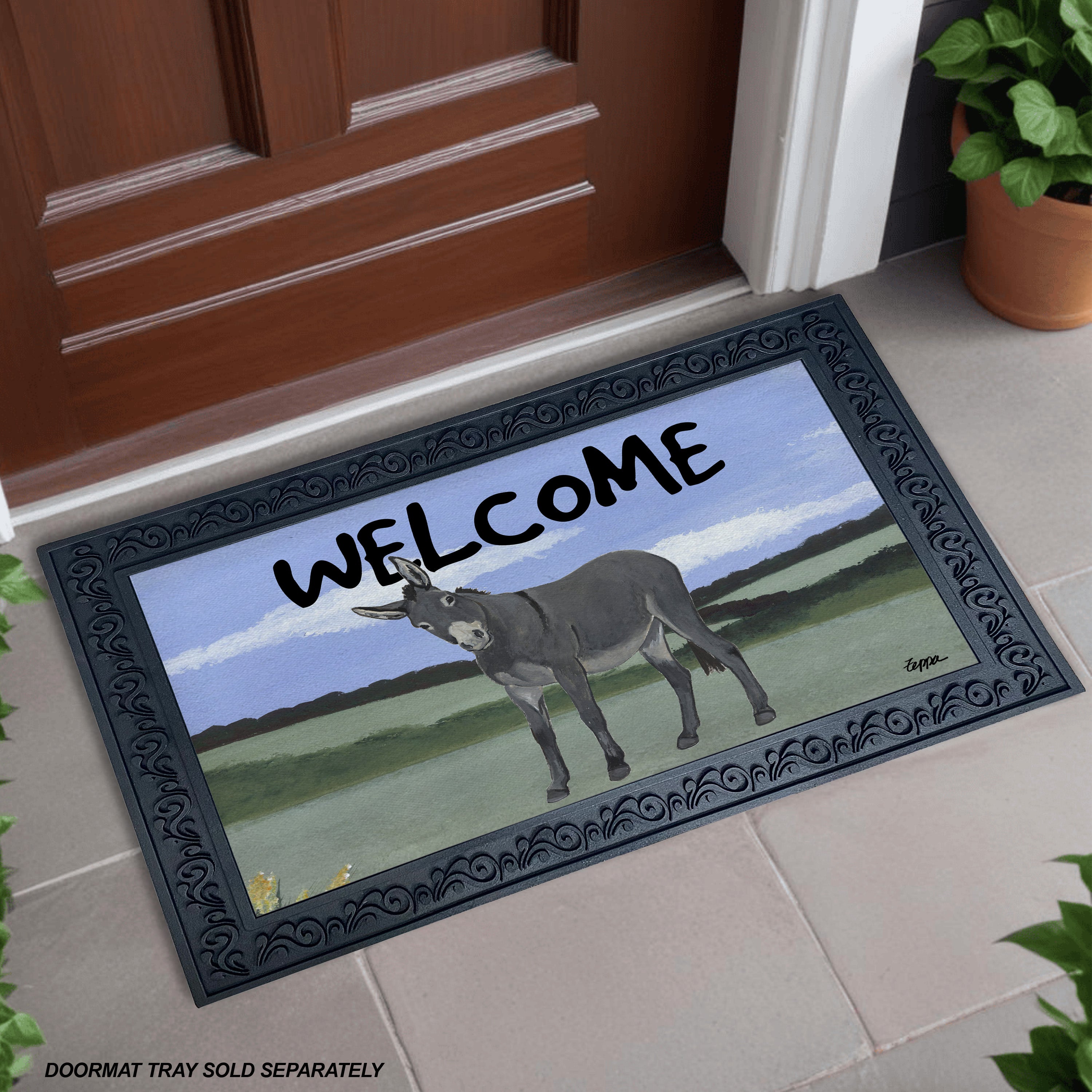 Donkey in a field Welcome doormat in a scrolled rubber tray at a front door.