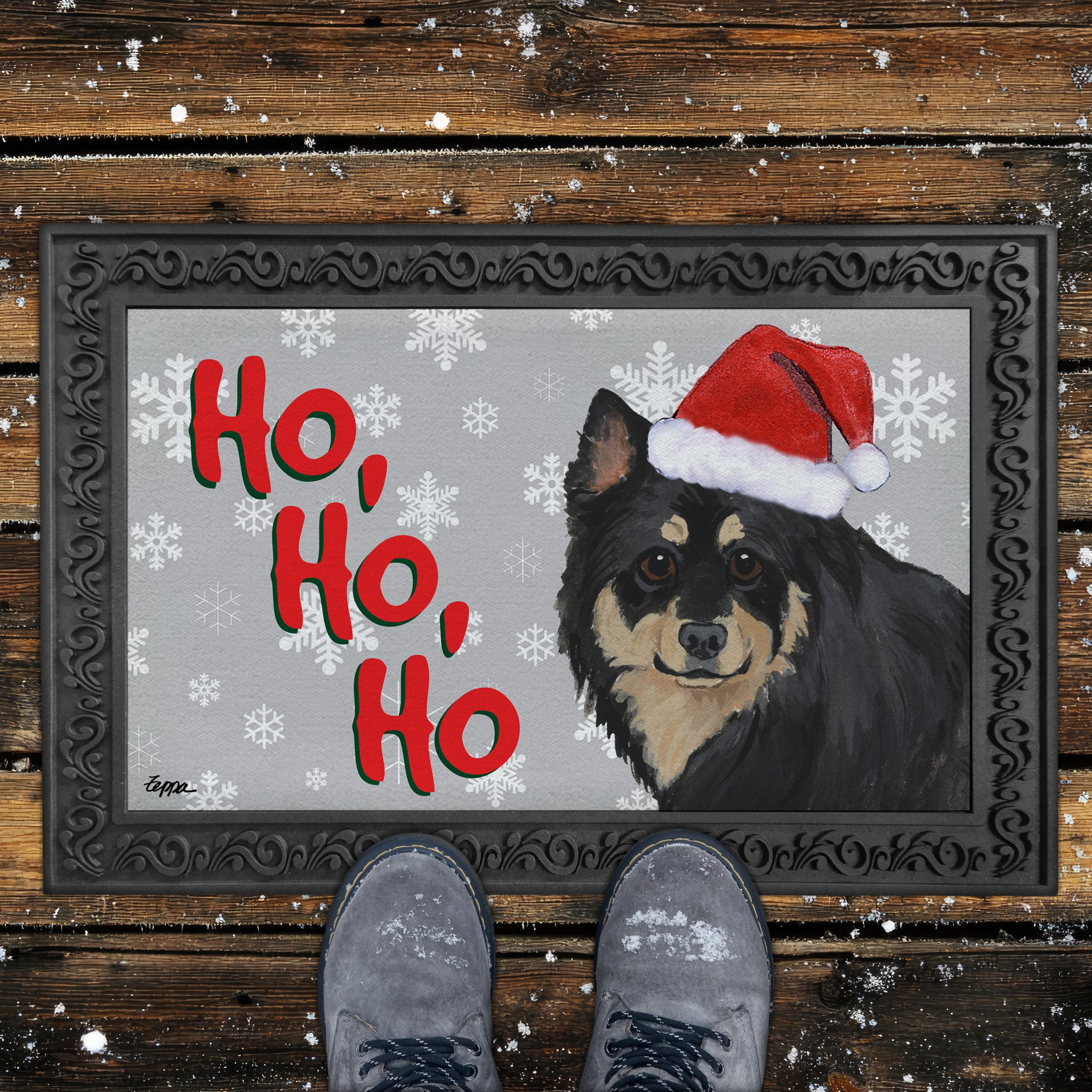 Doormat with a Finnish Lapphund wearing a Santa hat and 'Ho, Ho, Ho' text on a grey background.