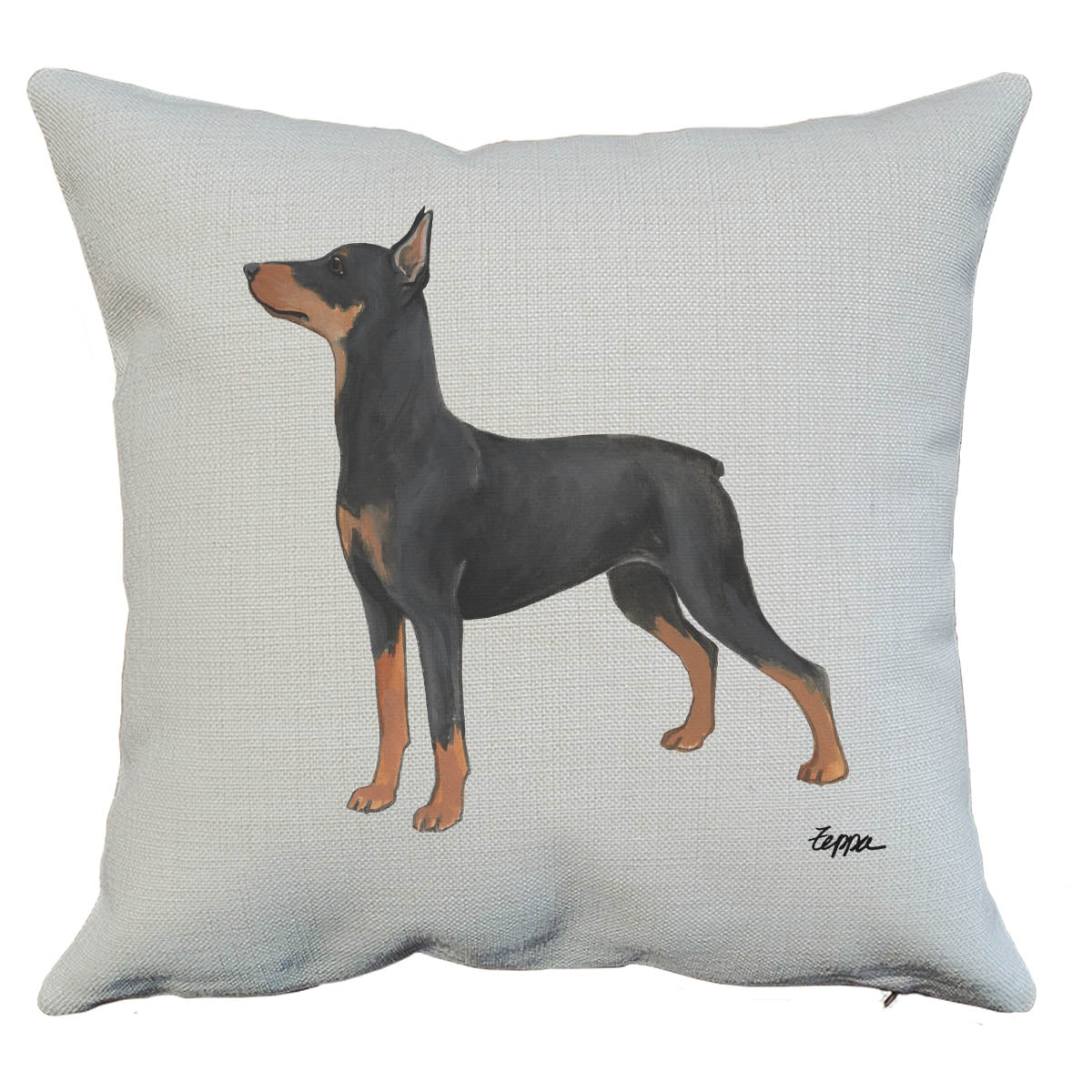 A square throw pillow in a beige linen-textured fabric, featuring a printed illustration of a German Pinscher.