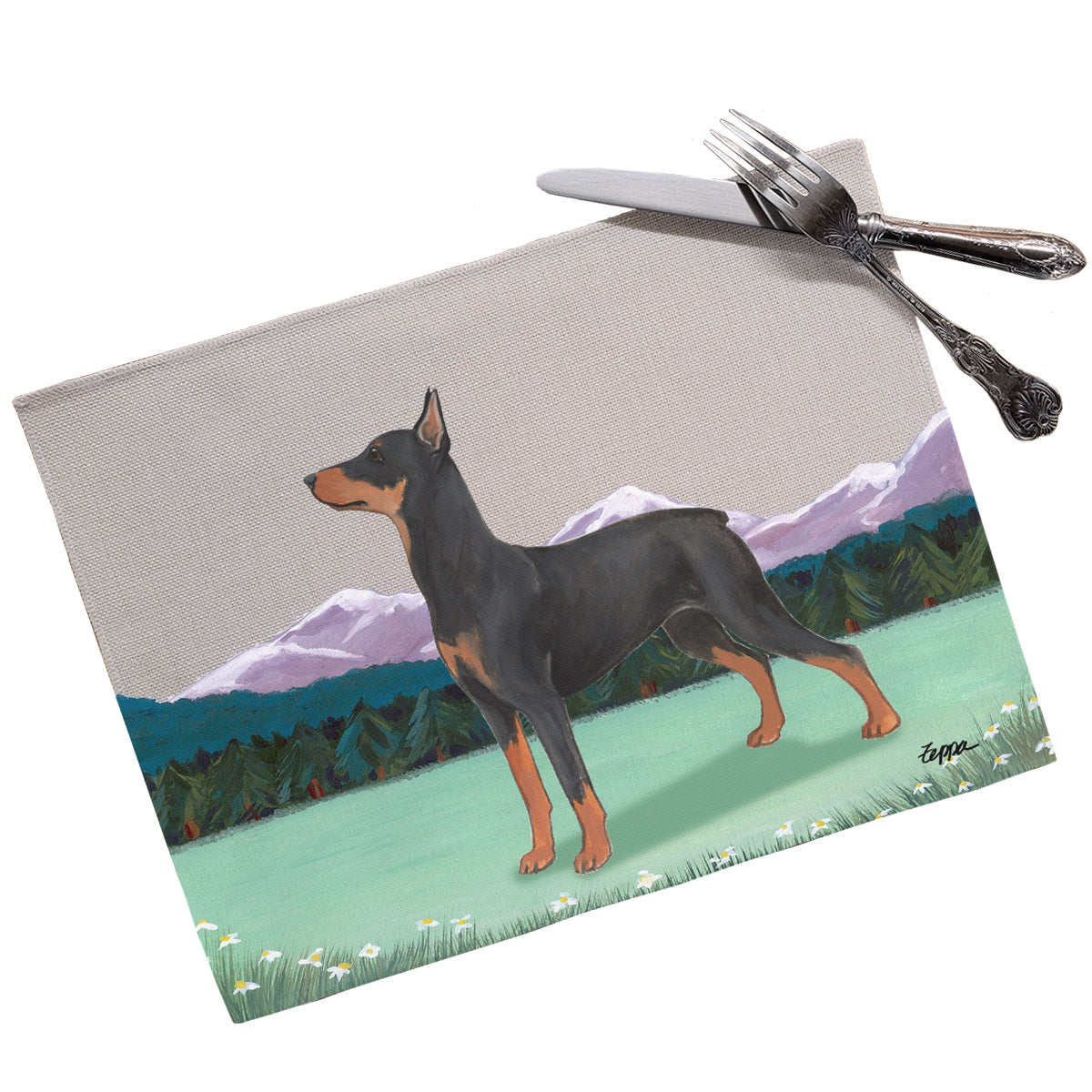 German Pinscher in a mountain setting on a linen placemat.