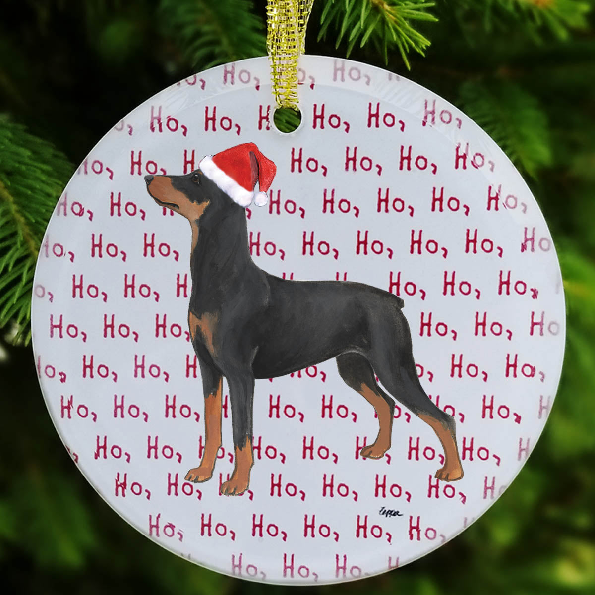 A frosted white glass ornament  featuring a German Pinscher  wearing a red Santa hat on a repeating red 'Ho Ho Ho' text pattern.
