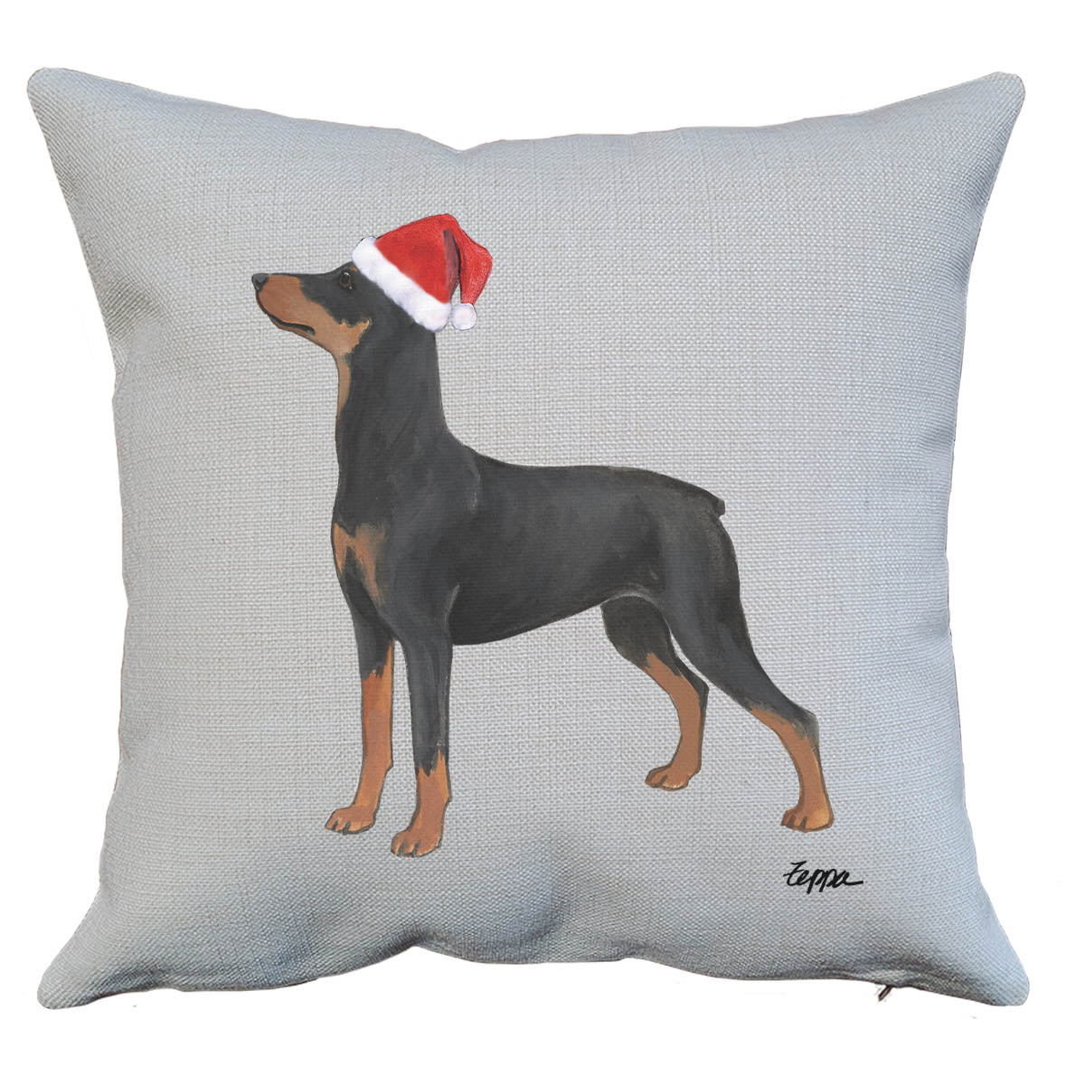 German Pinscher in a Santa hat on a linen throw pillow.