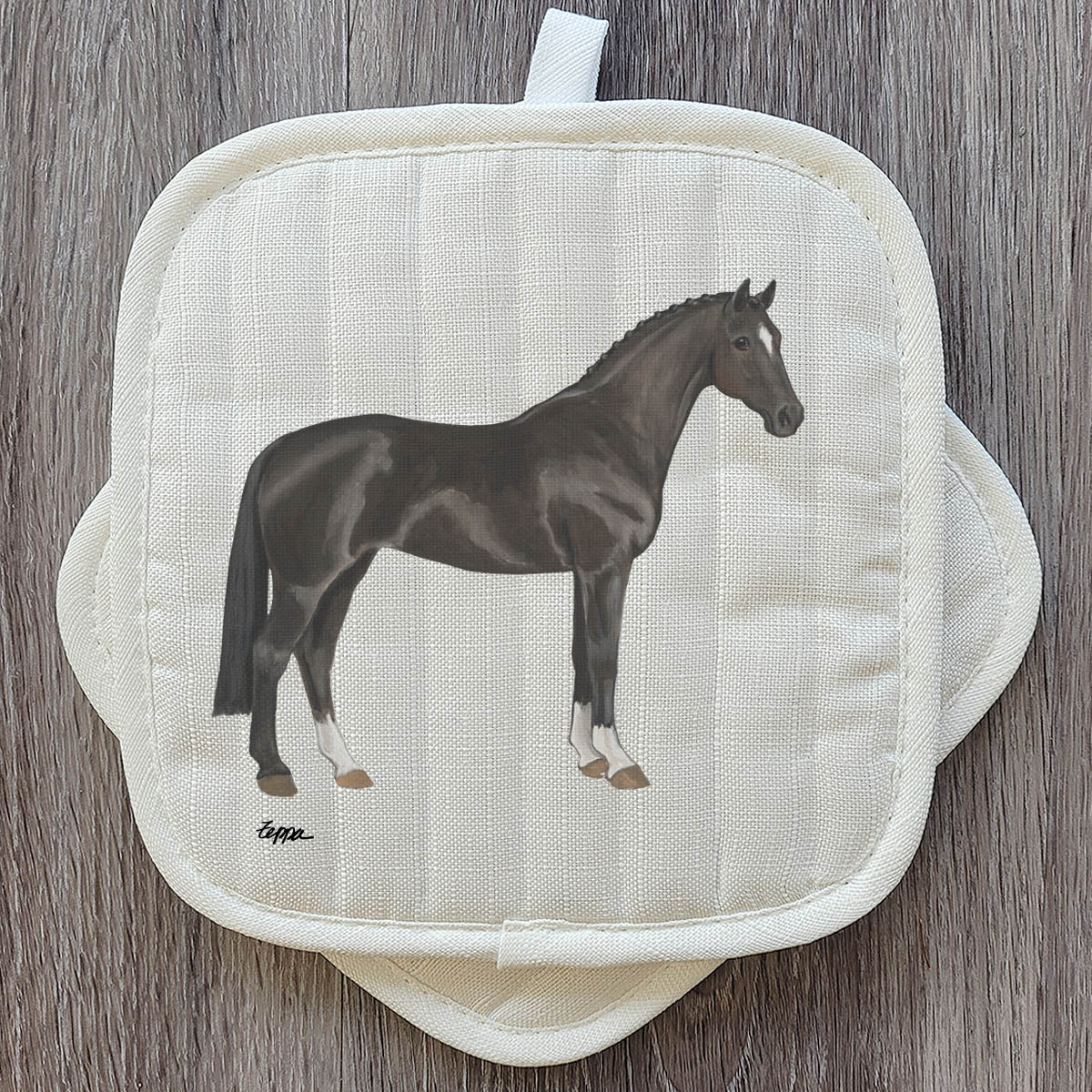 Hanoverian horse illustration on a beige quilted pot holders.