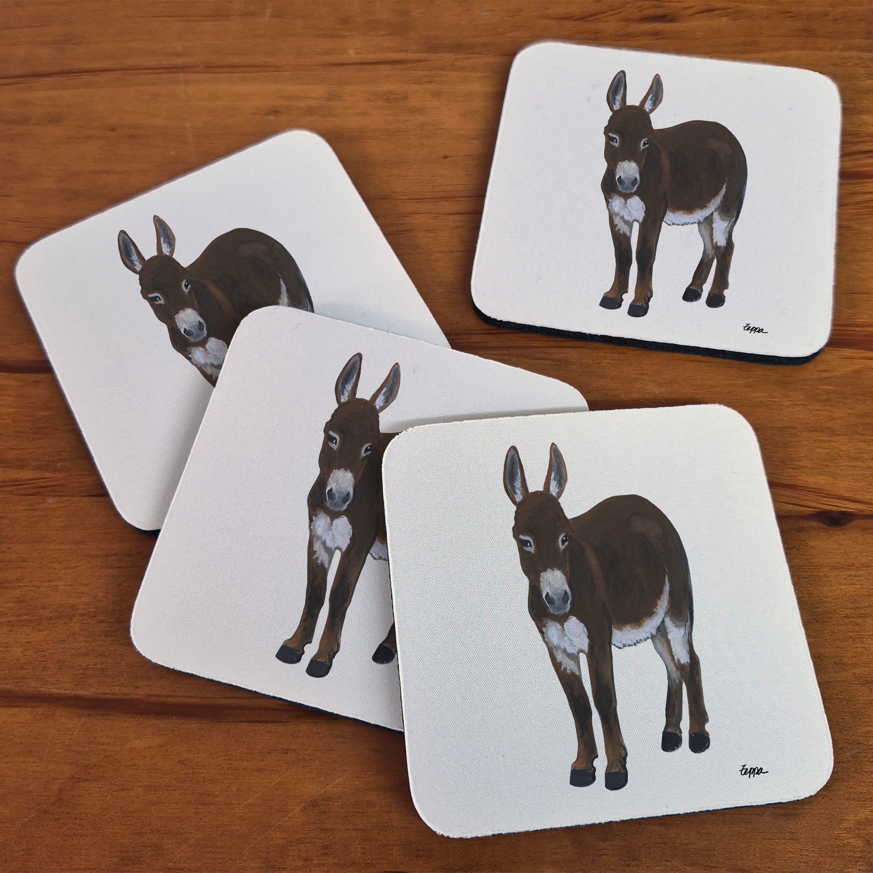 Mini Donkey design on beige square beverage coasters with rounded corners.