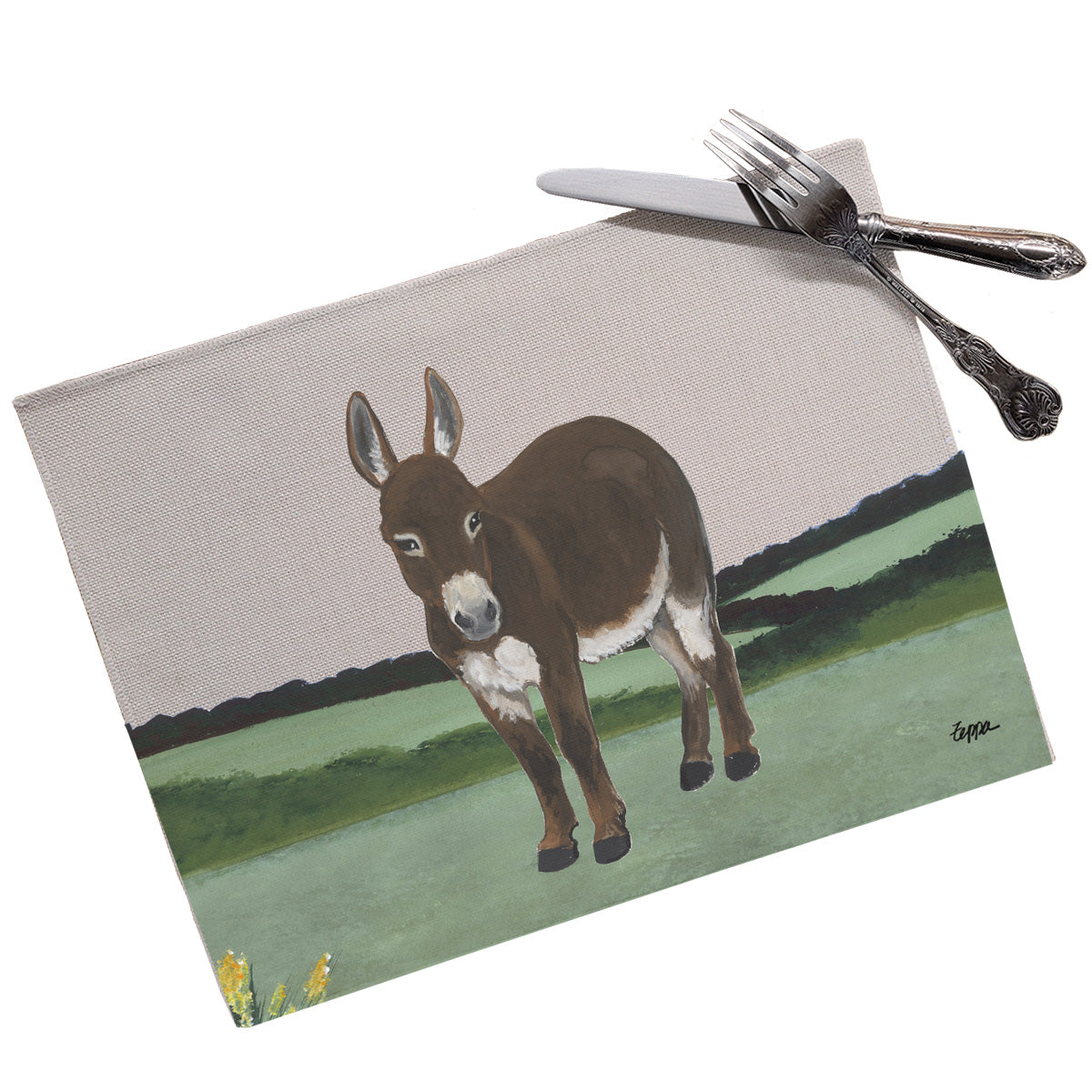 Mini Donkey in a landscape on a linen placemat.