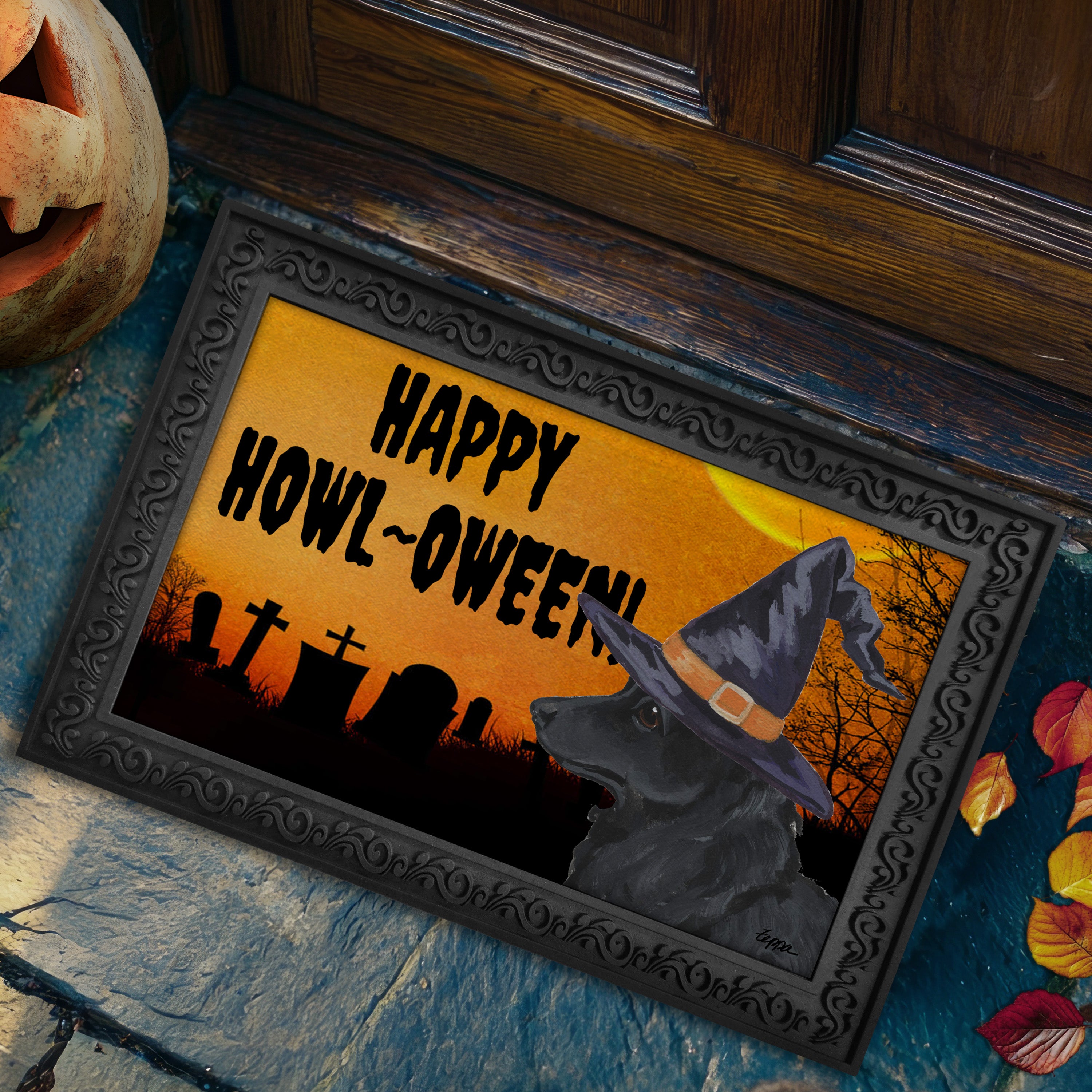 Mudi in a witch's hat on a Happy Howl-oween doormat.