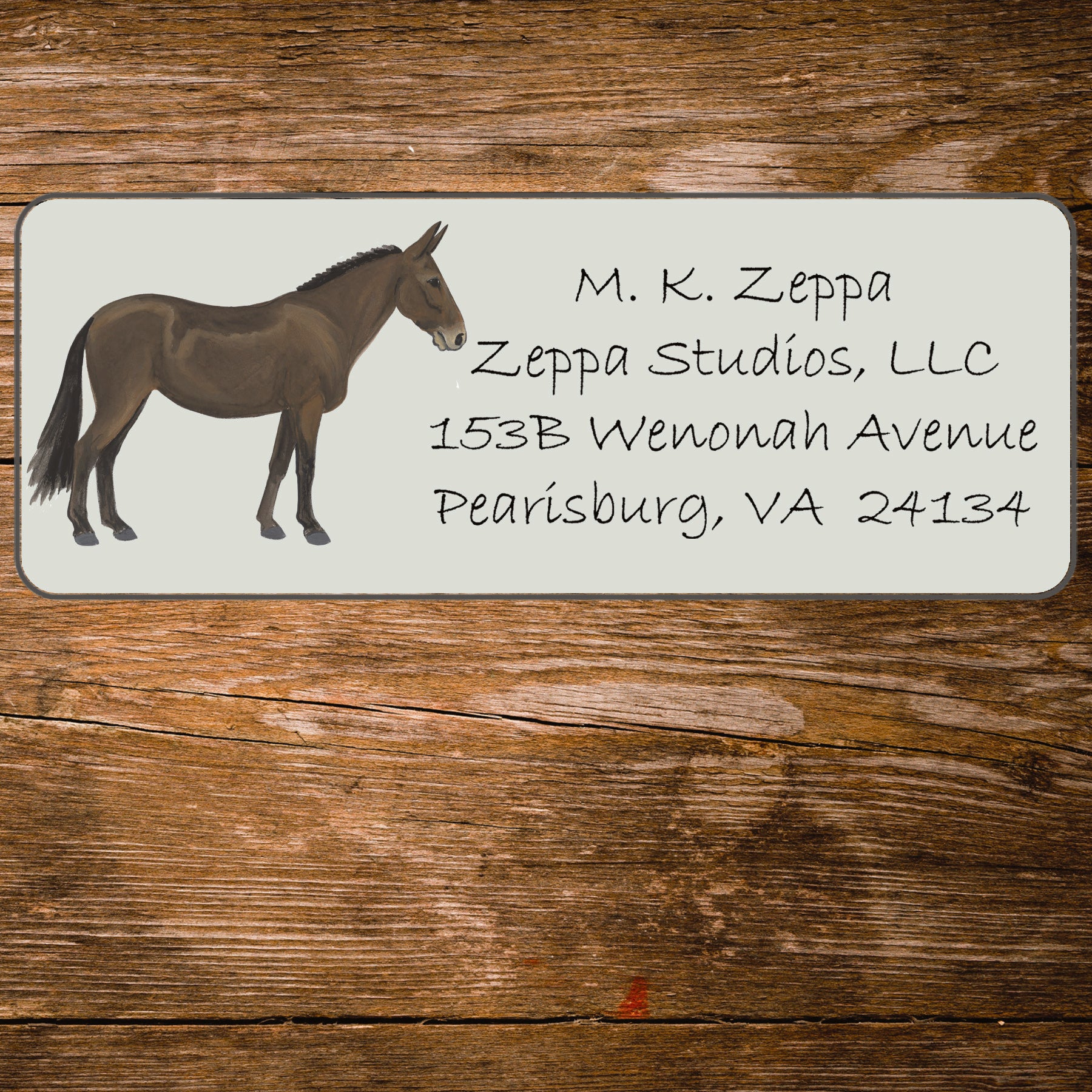 Mule illustration on an ivory return address label.