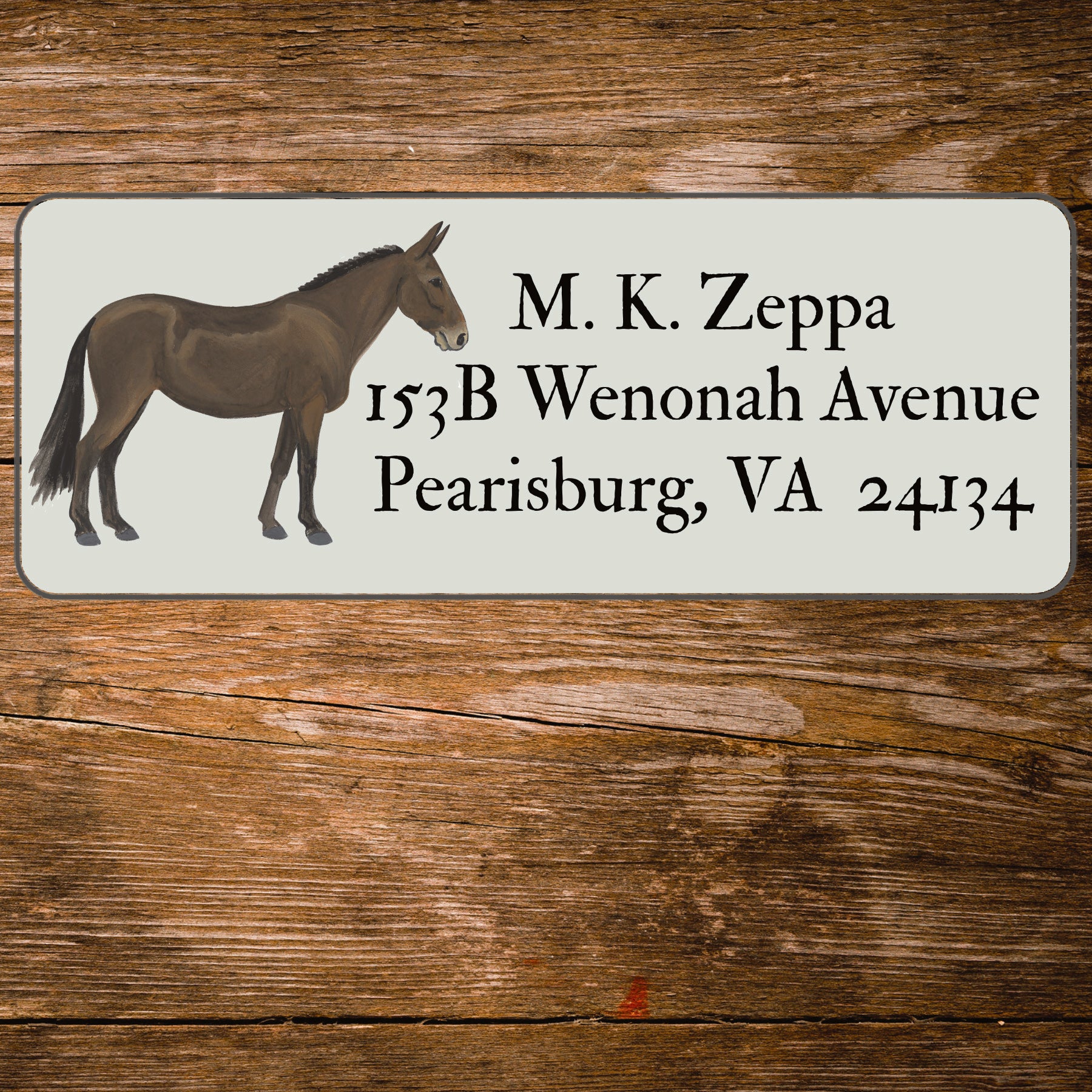 Mule illustration on an ivory return address label.