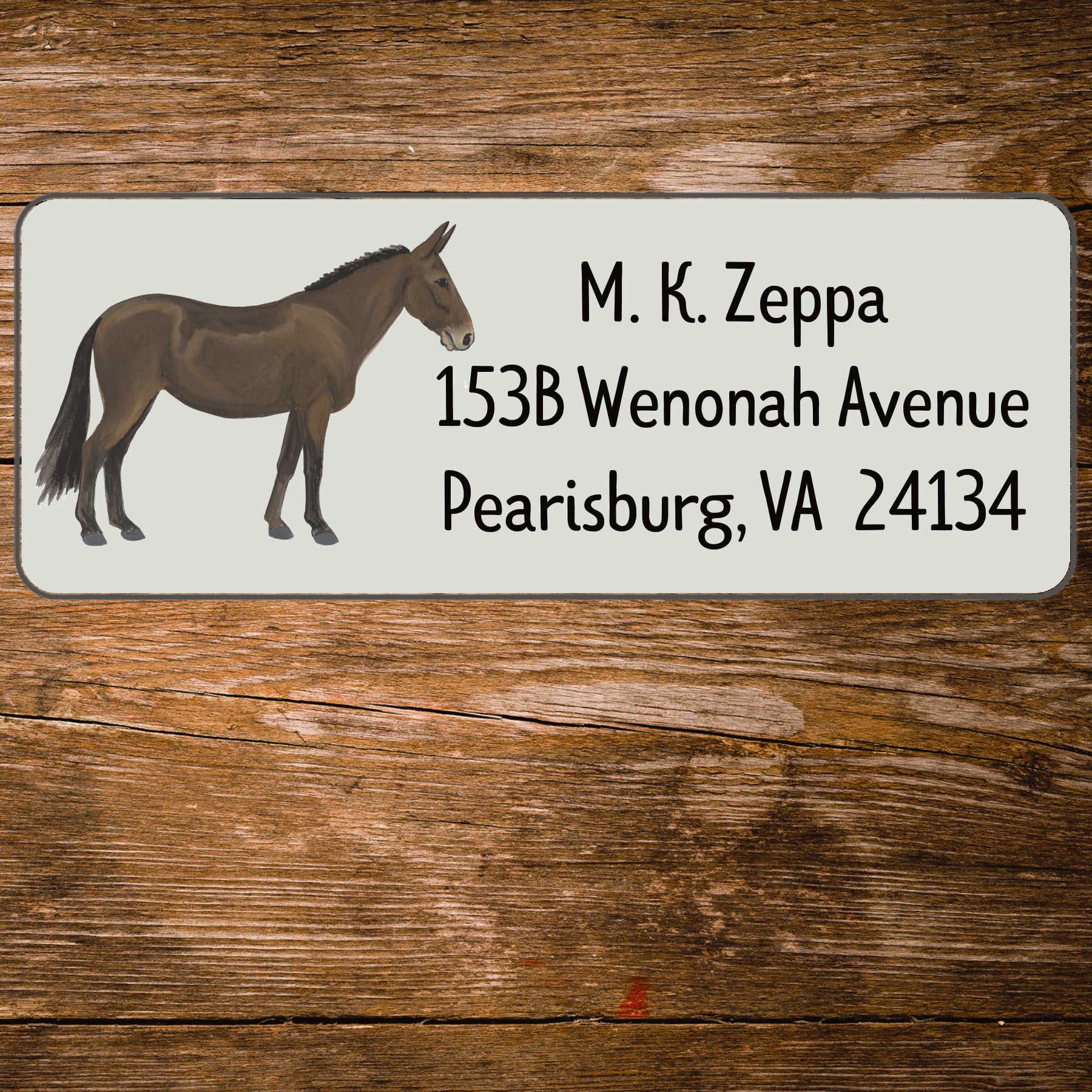 Mule illustration on an ivory return address label.