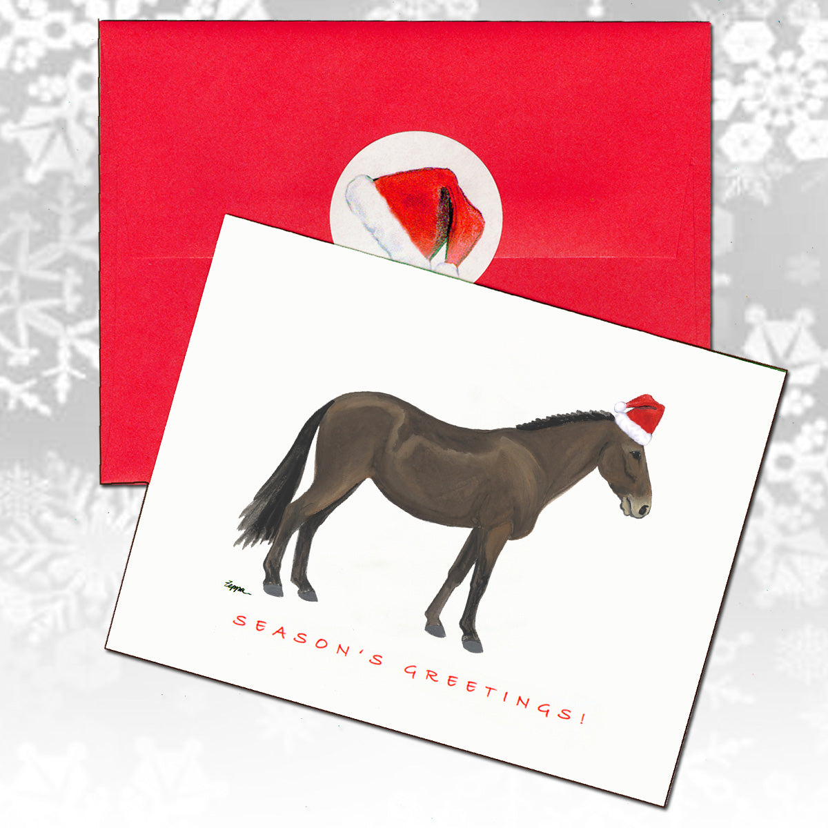 A holiday greeting card featuring an illustration of a mule wearing a red Santa hat, with the text 'SEASON'S GREETINGS!' in front of a red envelope.