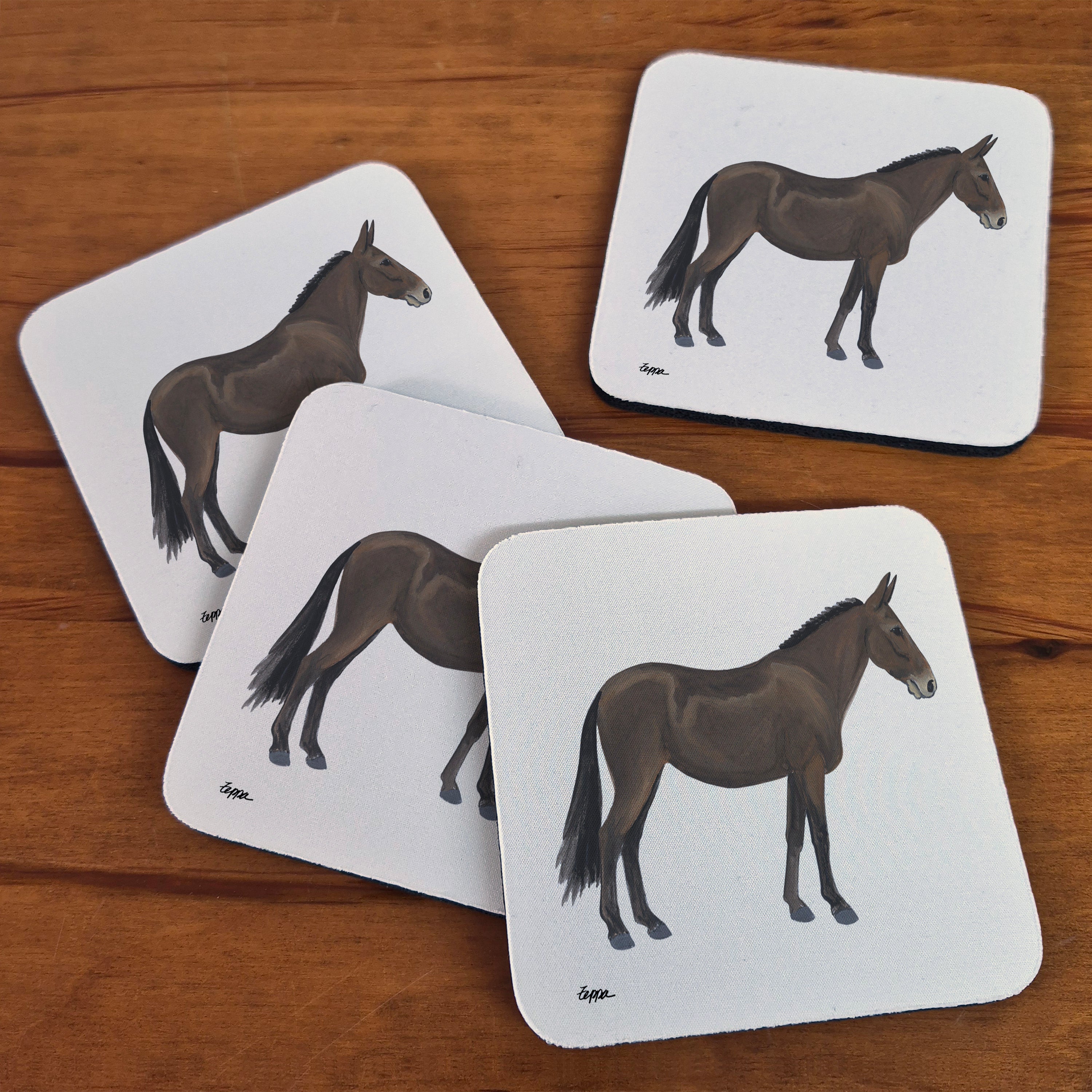 Mule illustration on a set of 4 square beige coasters with rounded corners.